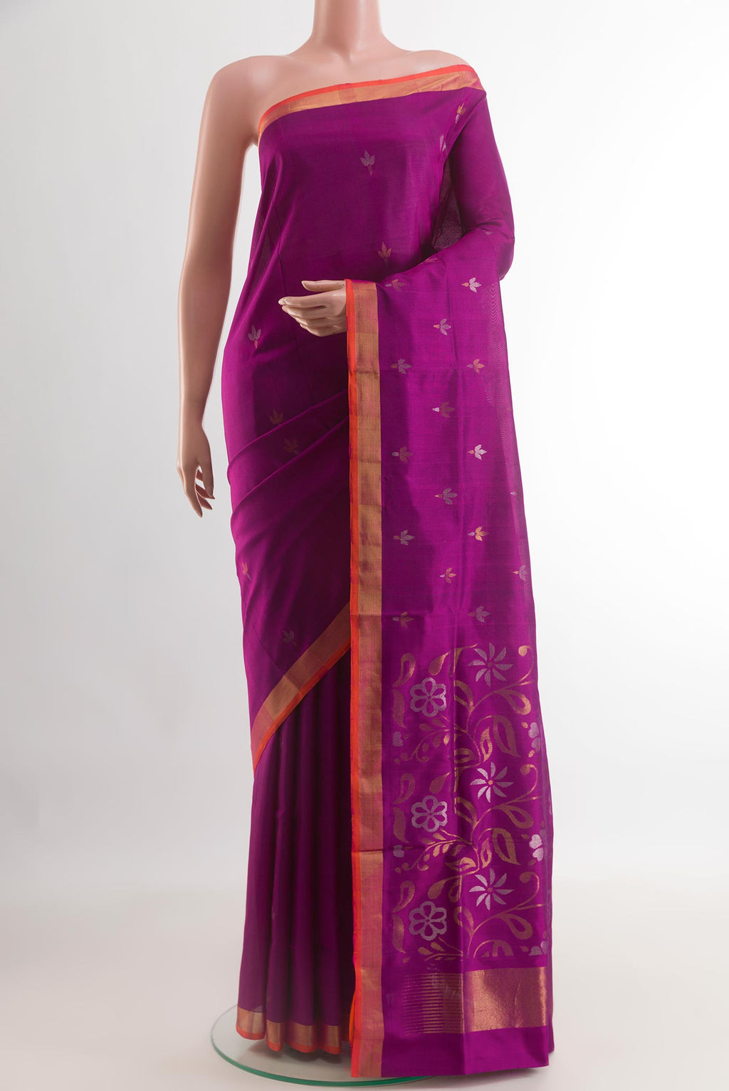 Purple Uppada Silk Saree with Zari Butta on the body and Zari Border.  displayed on a mannequin