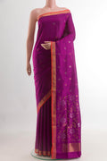 Purple Uppada Silk Saree with Zari Butta on the body and Zari Border.  displayed on a mannequin