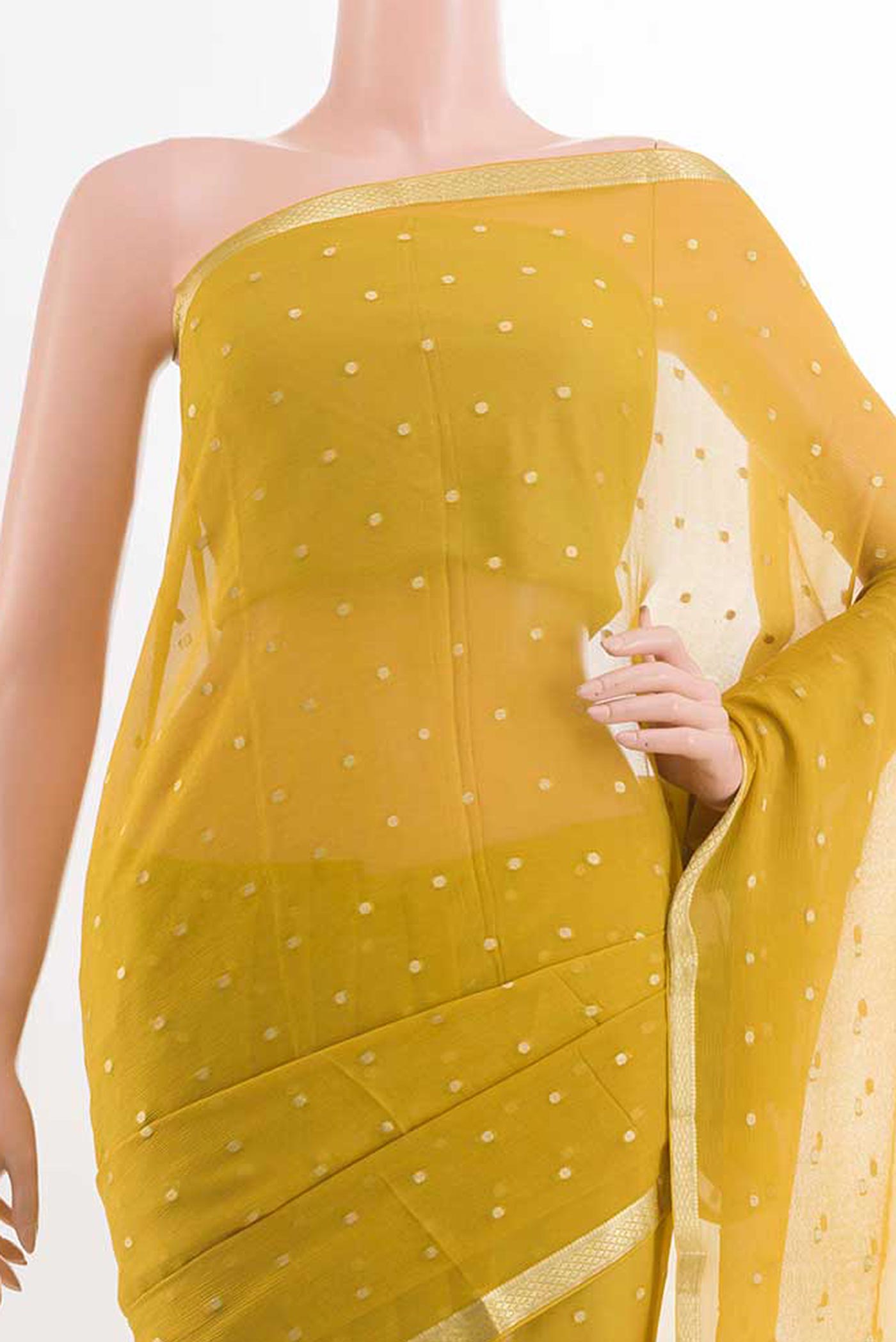Border image of Yellow Mysore Chiffon Saree with Zari Butta on the body and Zari Border