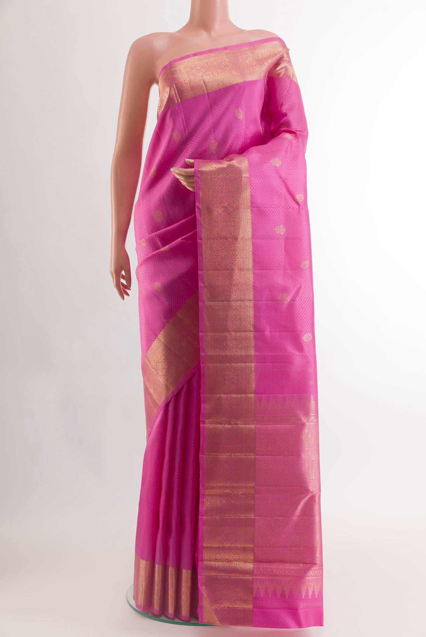 Pink Kanchipuram Silk Saree with Jacquard With Zari Butta on the body and Zari Border.  displayed on a mannequin
