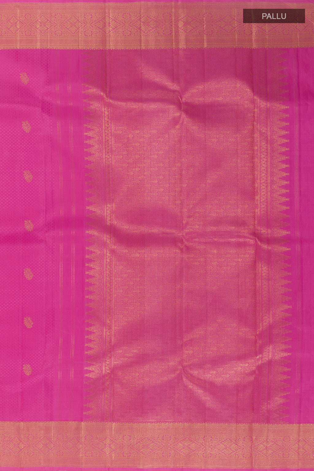 Close up image of the pallu of Pink Kanchipuram Silk Saree with Jacquard With Zari Butta on the body and Zari Border. 