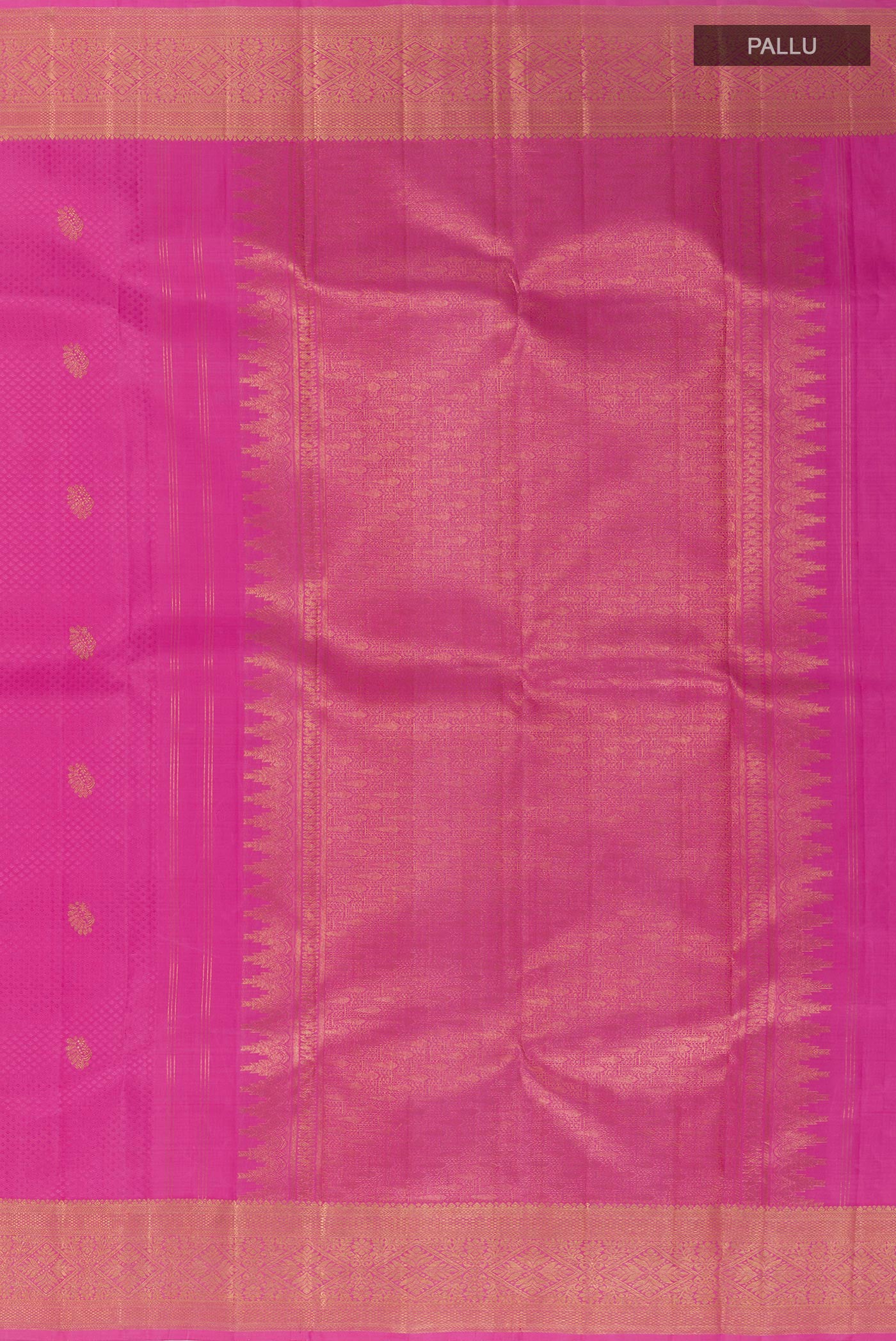 Close up image of the pallu of Pink Kanchipuram Silk Saree with Jacquard With Zari Butta on the body and Zari Border. 