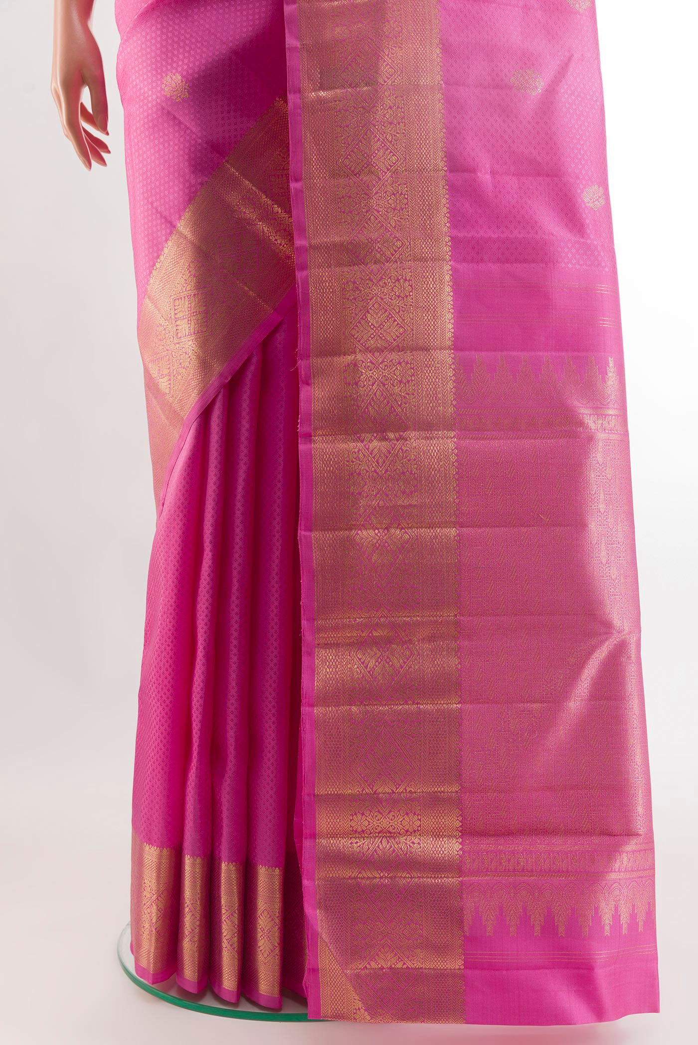 Pleats and pallu of Pink Kanchipuram Silk Saree with Jacquard With Zari Butta on the body and Zari Border. 