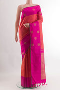 Brick Orange Kanjivaram Silk Saree with Jacquard design on the body and Plain Border.  displayed on a mannequin