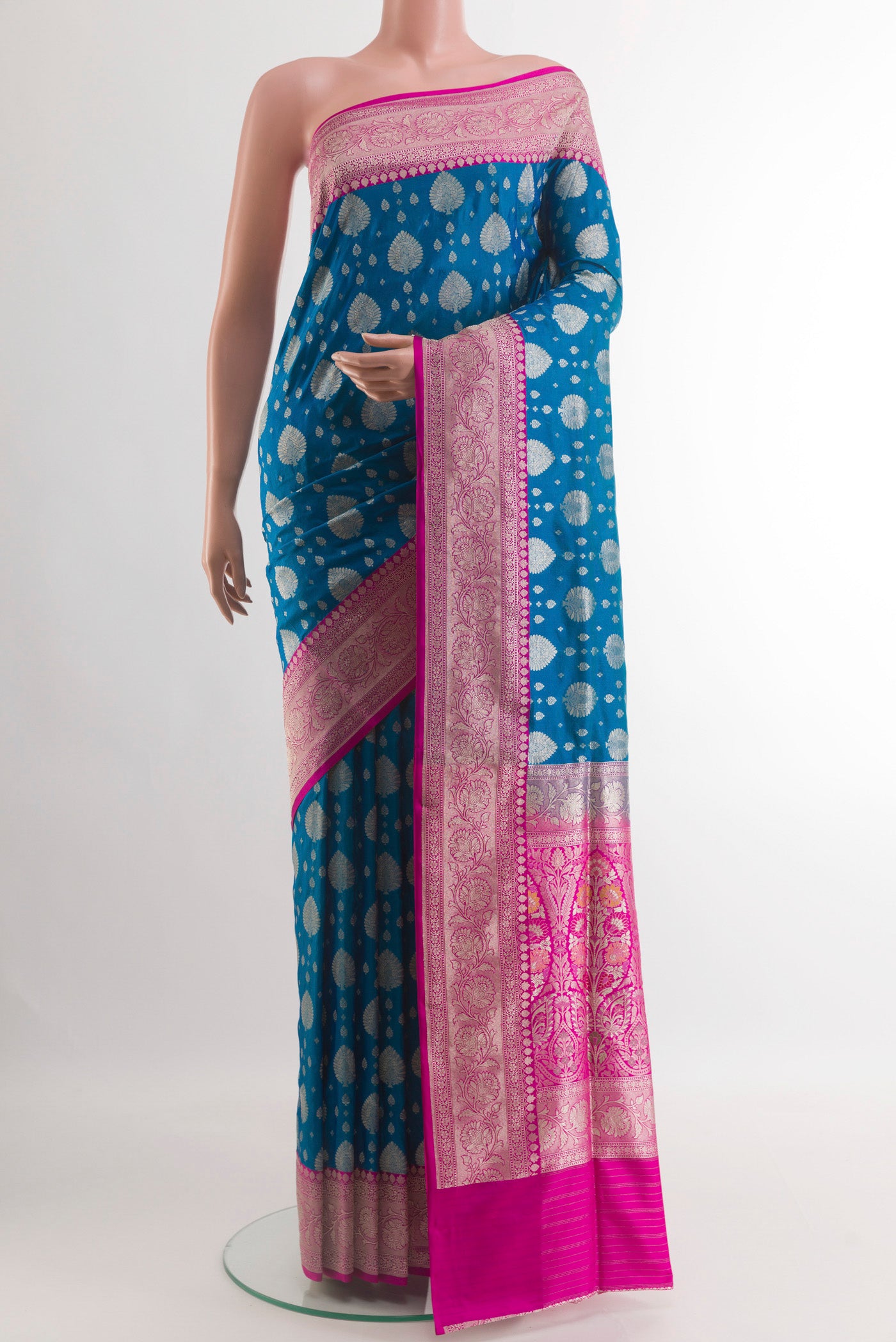 Blue Banarasi Silk Saree with Zari Brocade on the body and Zari Border.  displayed on a mannequin