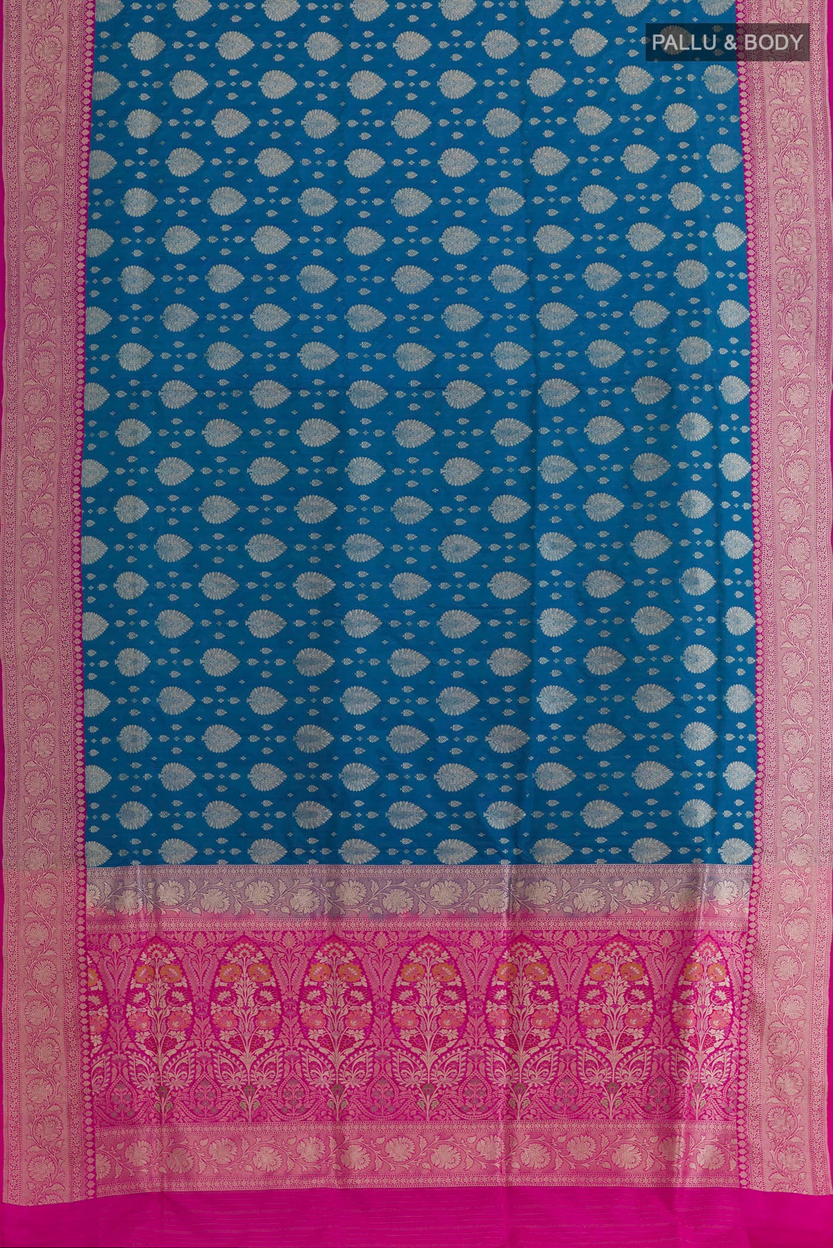 Flat view of Blue Banarasi Silk Saree with Zari Brocade on the body and Zari Border. 