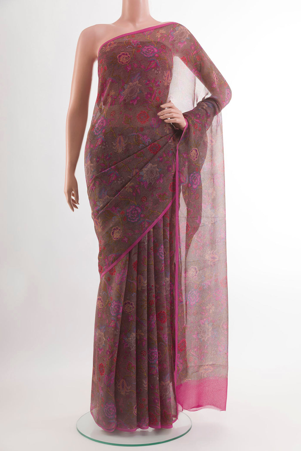 Grey Chiffon Saree with Printed design on the body and Zari Border.  displayed on a mannequin