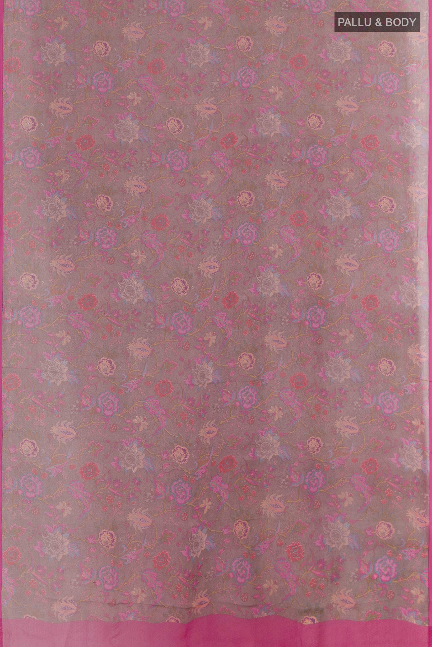 Flat view of Grey Chiffon Saree with Printed design on the body and Zari Border. 