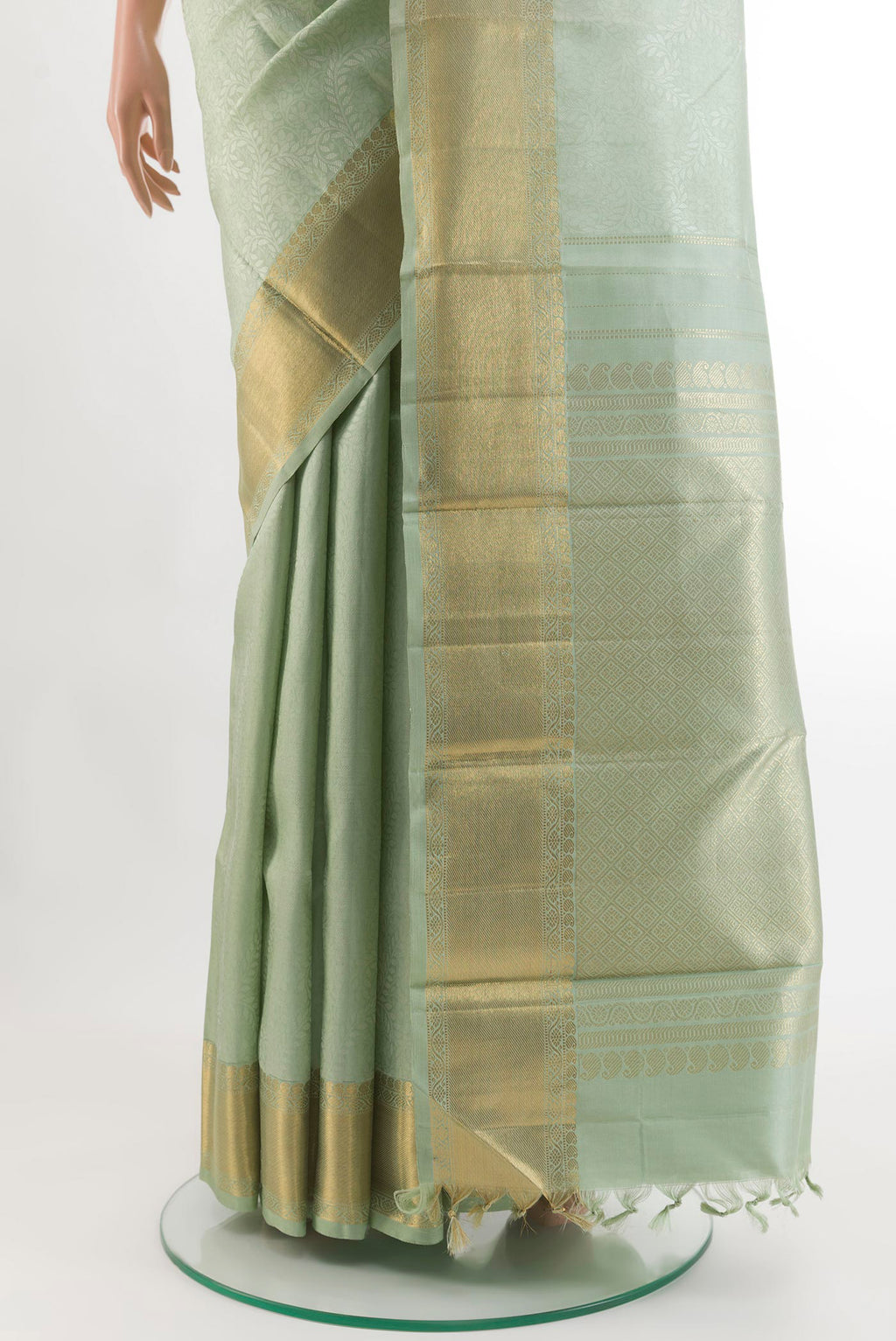 Pleats and pallu of Mint Green Kanchipuram Silk Saree with Jacquard design on the body and Zari Border. 
