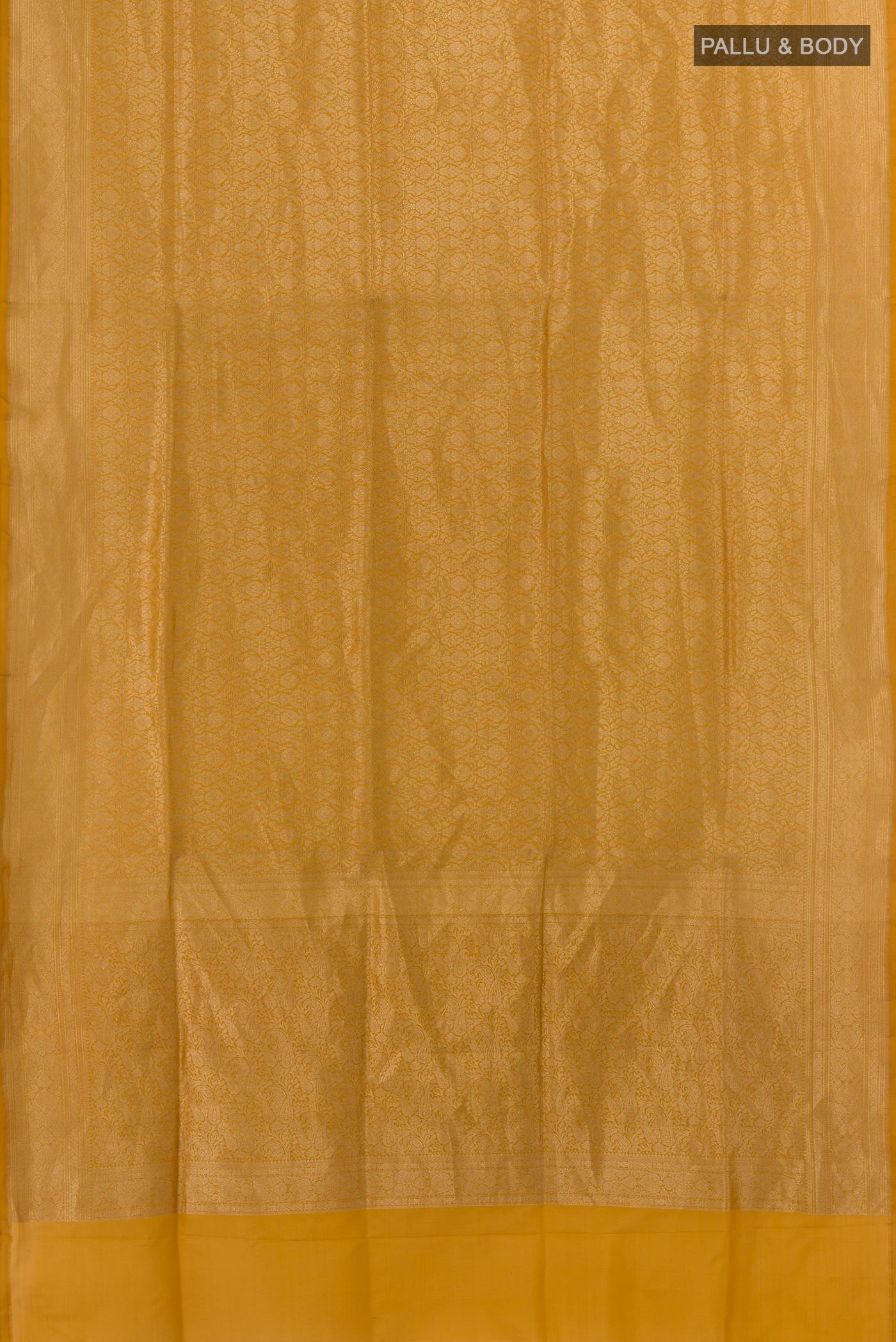 Flat view of Mustard Banarasi Silk Saree with Zari Brocade on the body and Zari Border. 