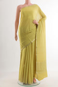 Yellow Mysore Chiffon Saree with Embroidery on the body and Zari Border.  displayed on a mannequin