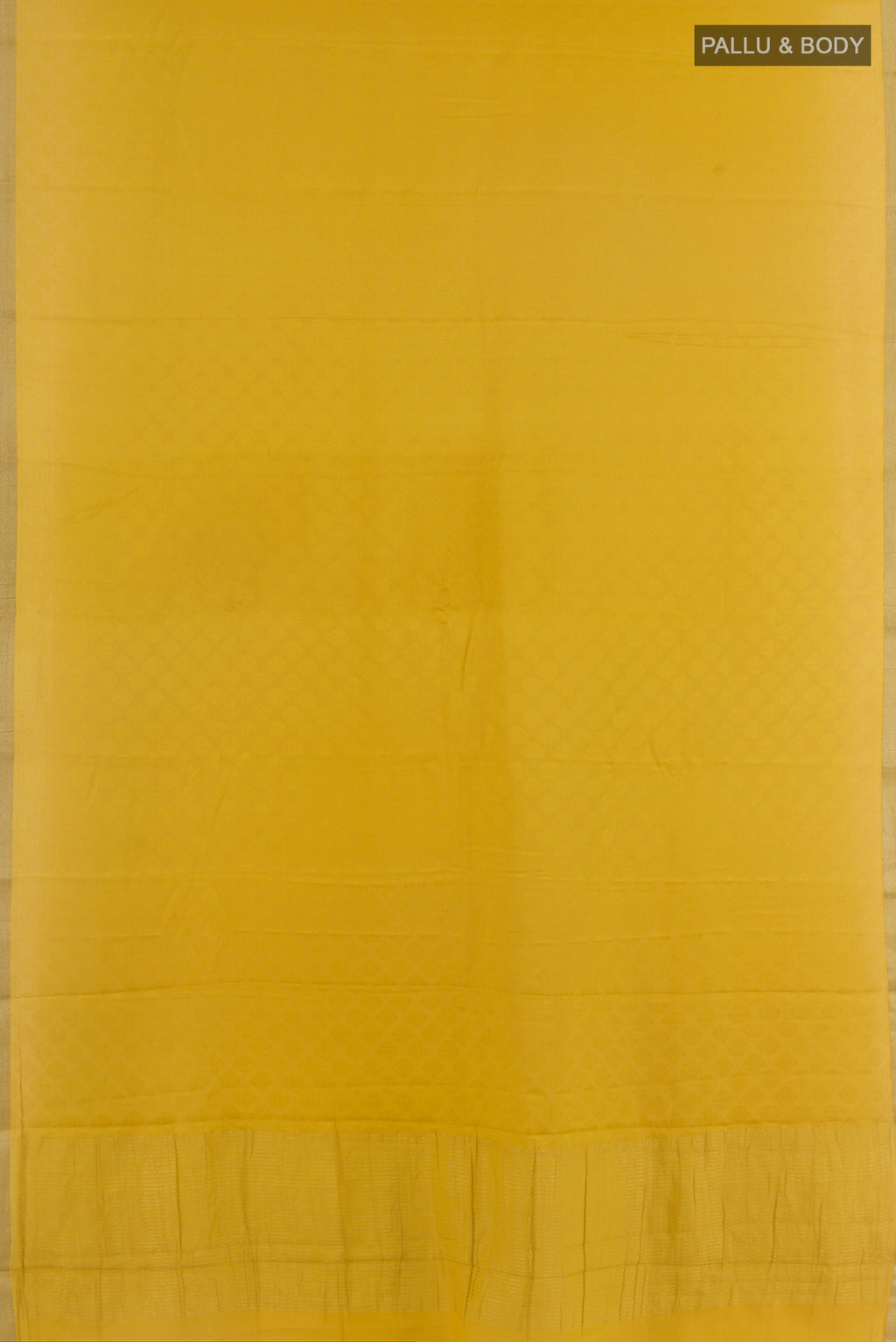Flat view of Yellow Mysore Crepe Saree with Jacquard design on the body and Zari Border. 