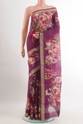 Purple Tussar Saree with Printed design on the body and Zari Border.  displayed on a mannequin
