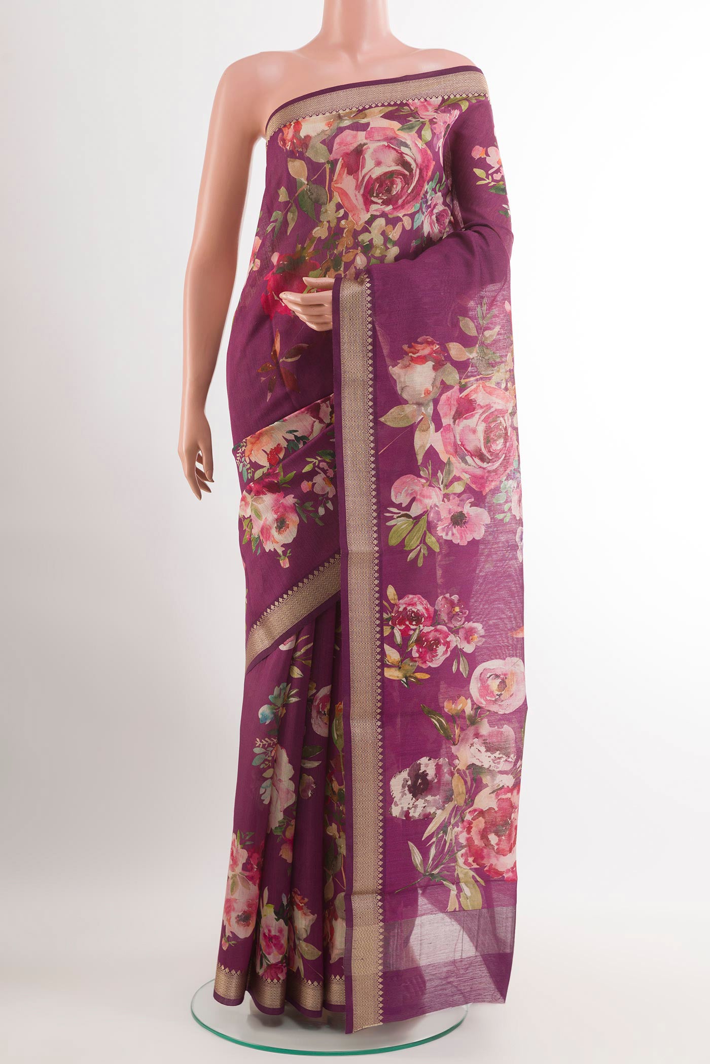 Purple Tussar Saree with Printed design on the body and Zari Border.  displayed on a mannequin
