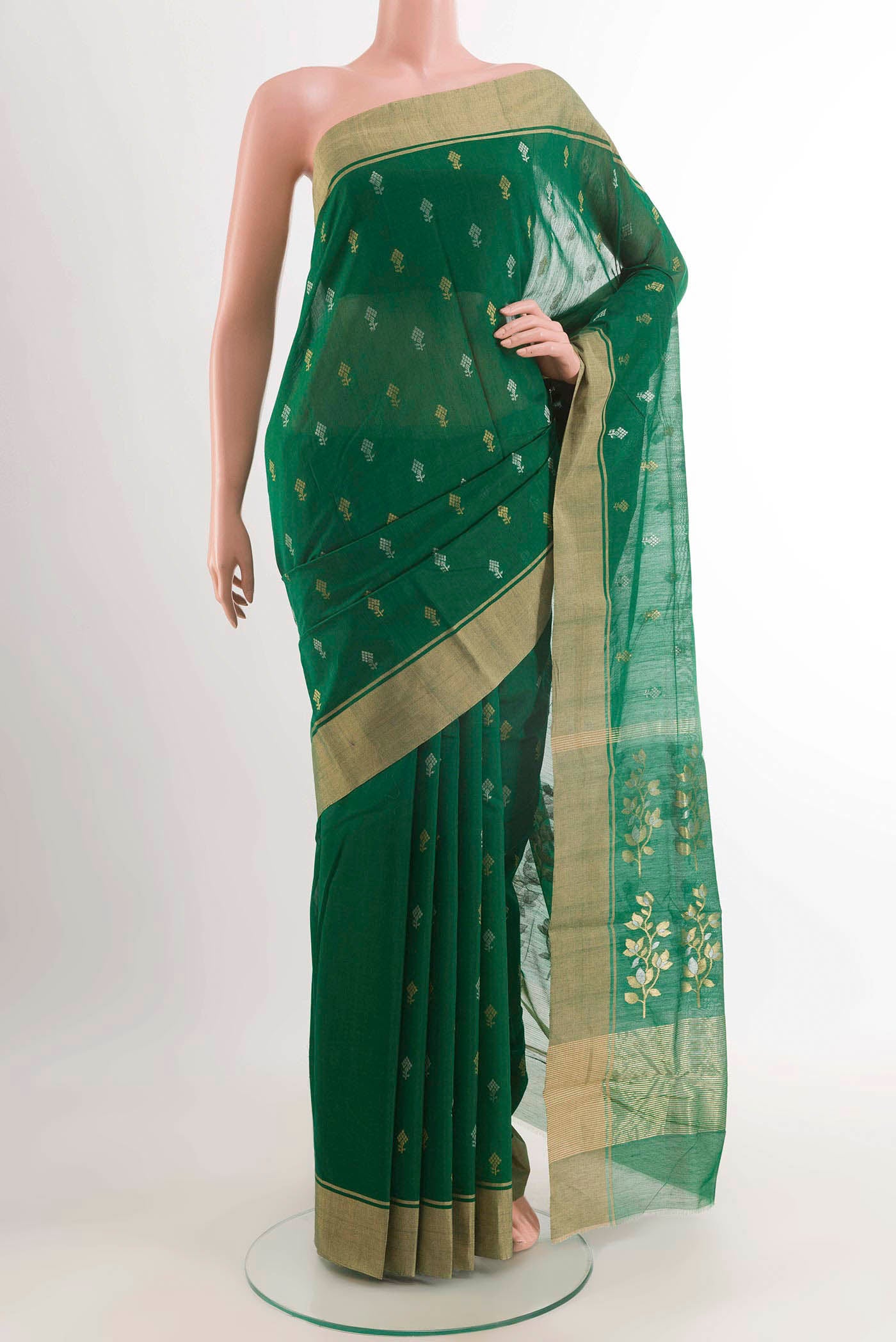 Green Chanderi Silk Cotton Saree with Zari Butta on the body and Zari Border displayed on a mannequin