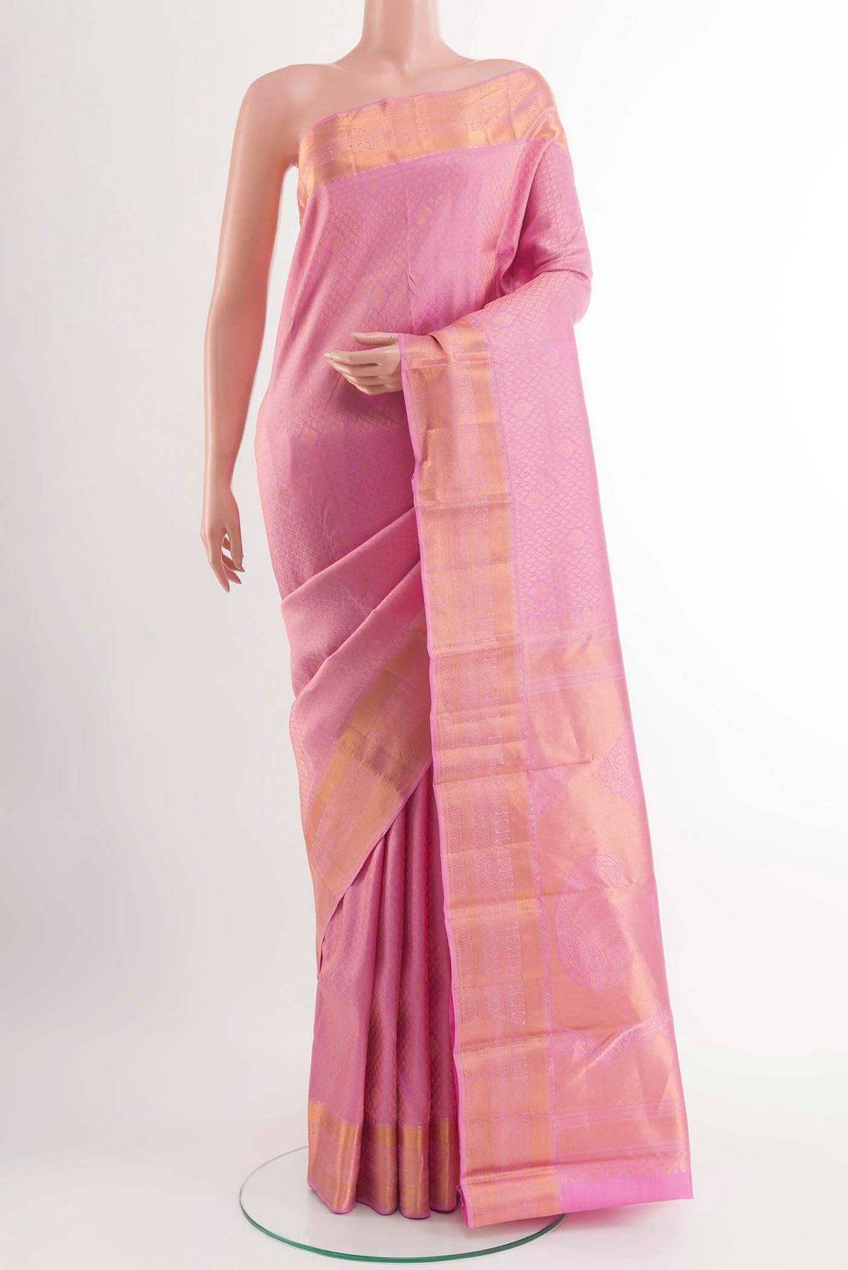 Pure Silk Pure Zari Pink Kanchipuram Saree with Zari Brocade on the body and Zari Border displayed on a mannequin