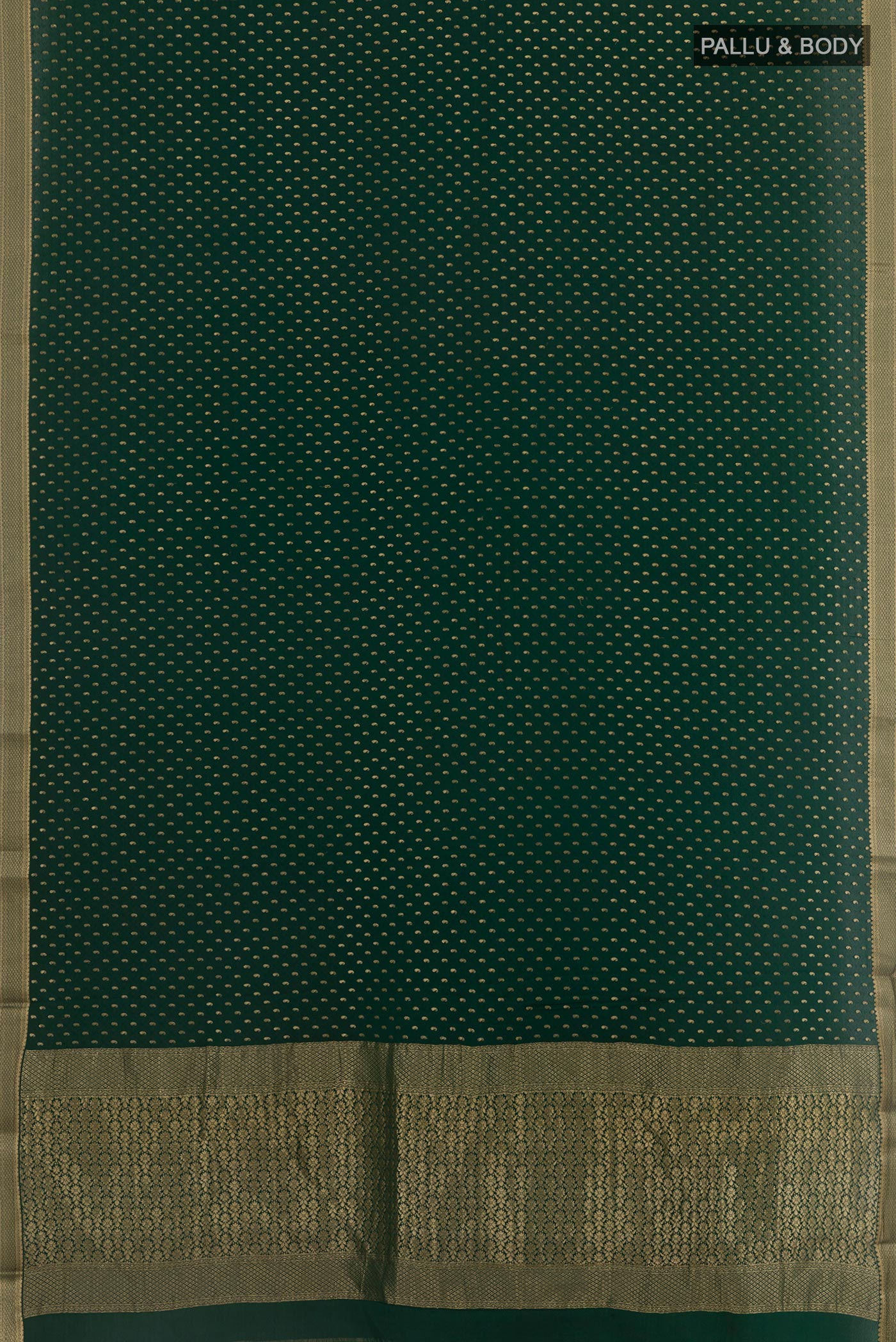 Flat view of Bottle Green Mysore Crepe Saree with Zari Butta on the body and Zari Border. 