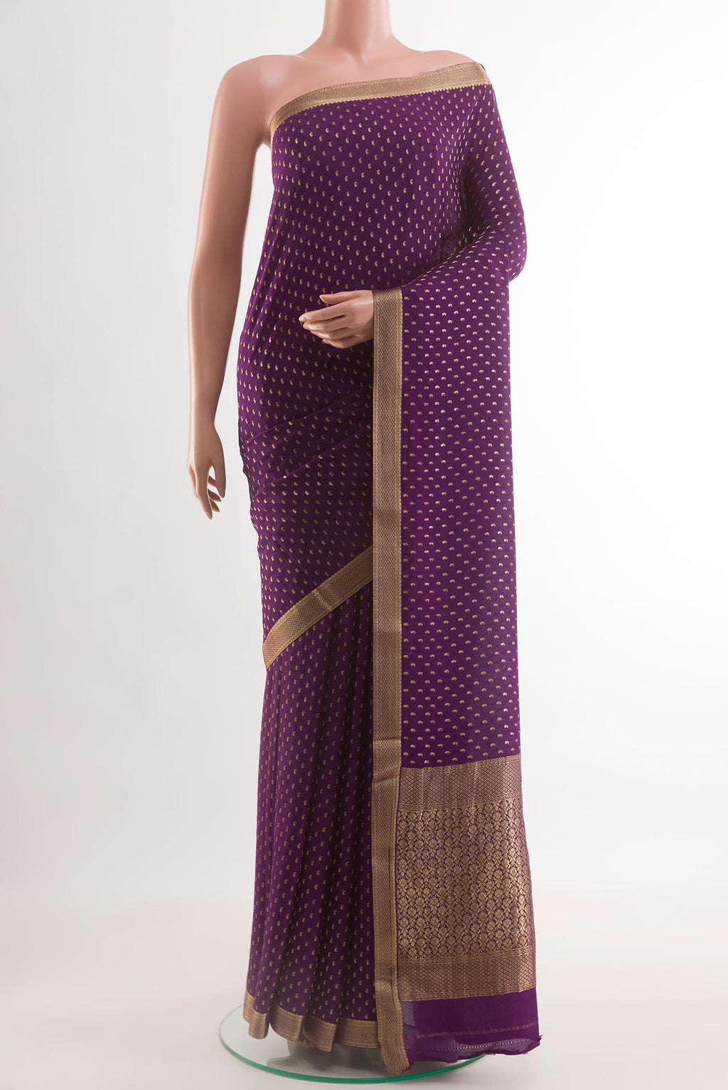Violet Mysore Crepe Saree with Zari Butta on the body and Zari Border.  displayed on a mannequin