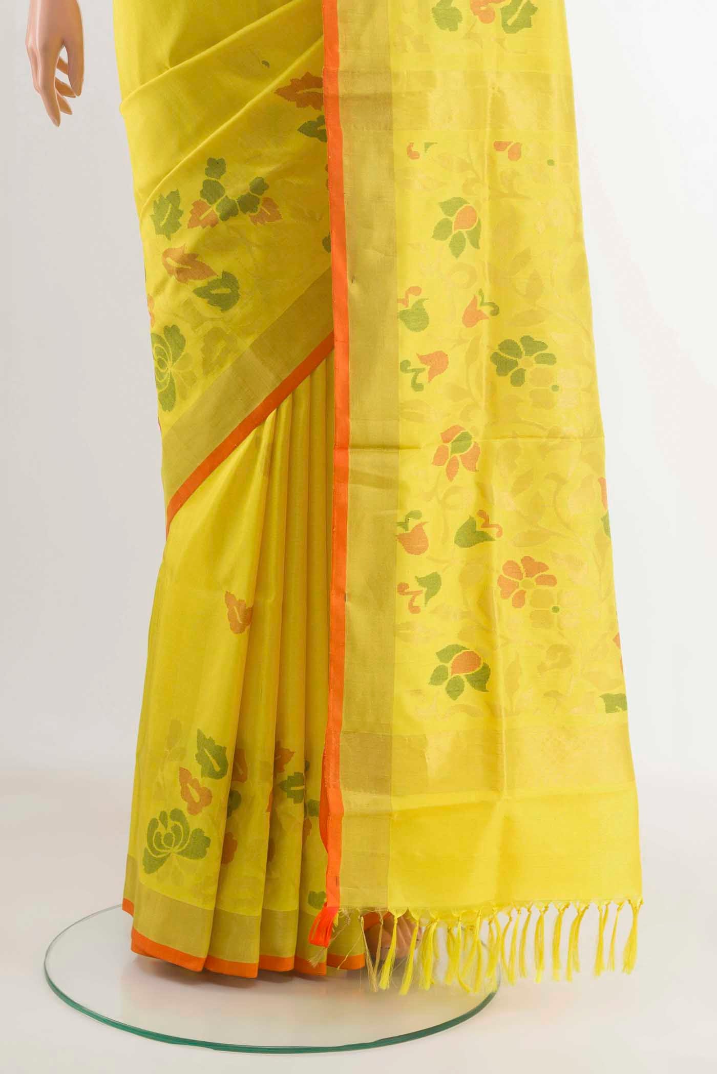 Pleats and pallu of Yellow Uppada Silk Saree with Zari Butta on the body and Zari Border