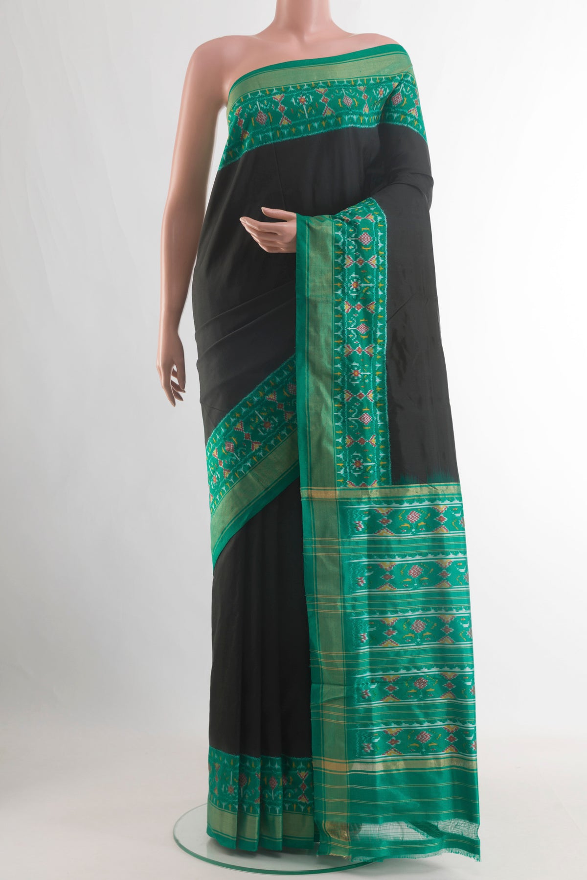 Black Pochampally Silk Saree with Plain Body and Zari Border.  displayed on a mannequin