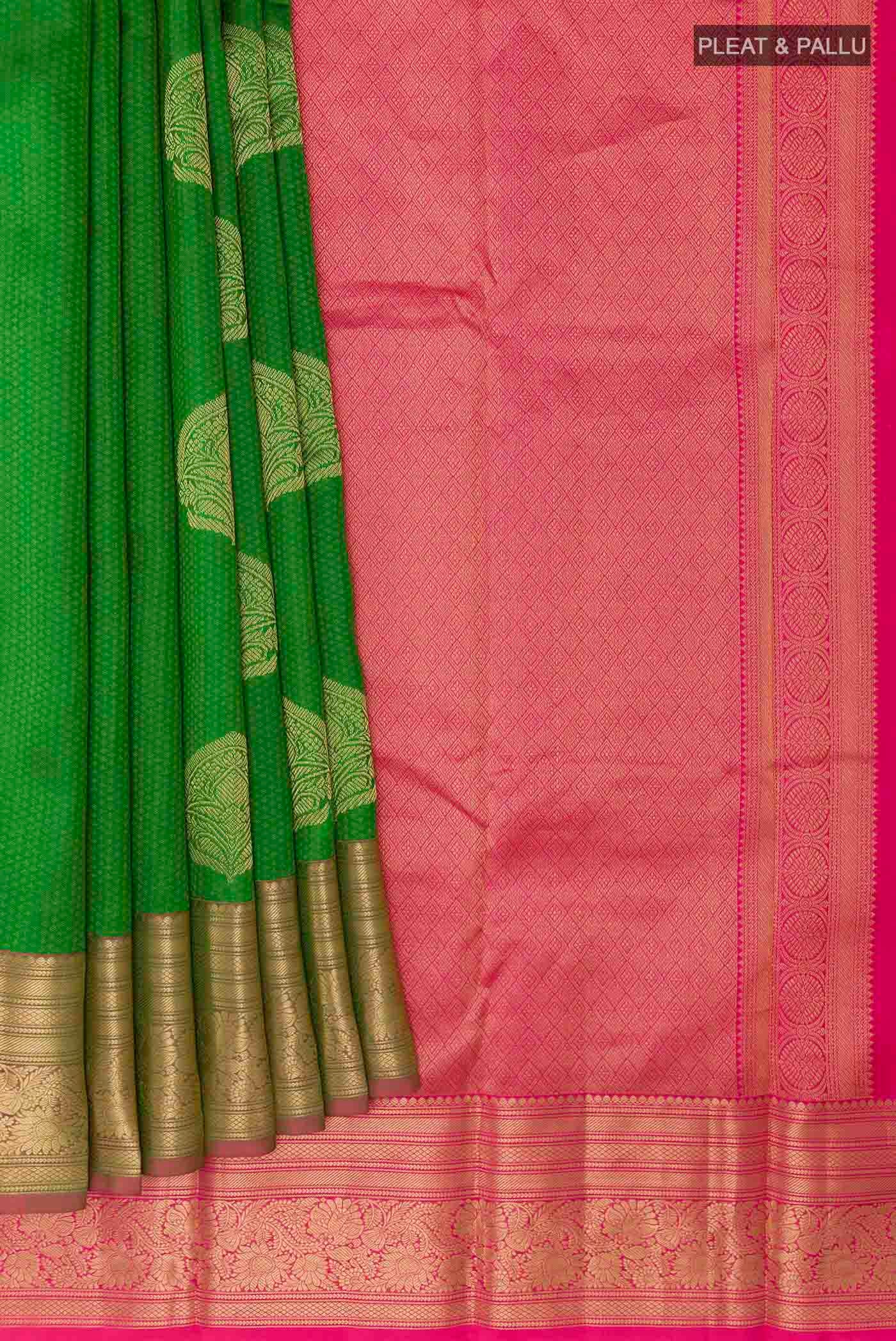 Pleats and pallu of Green Kanchipuram Silk Saree with Jacquard With Zari Butta on the body and Zari Border