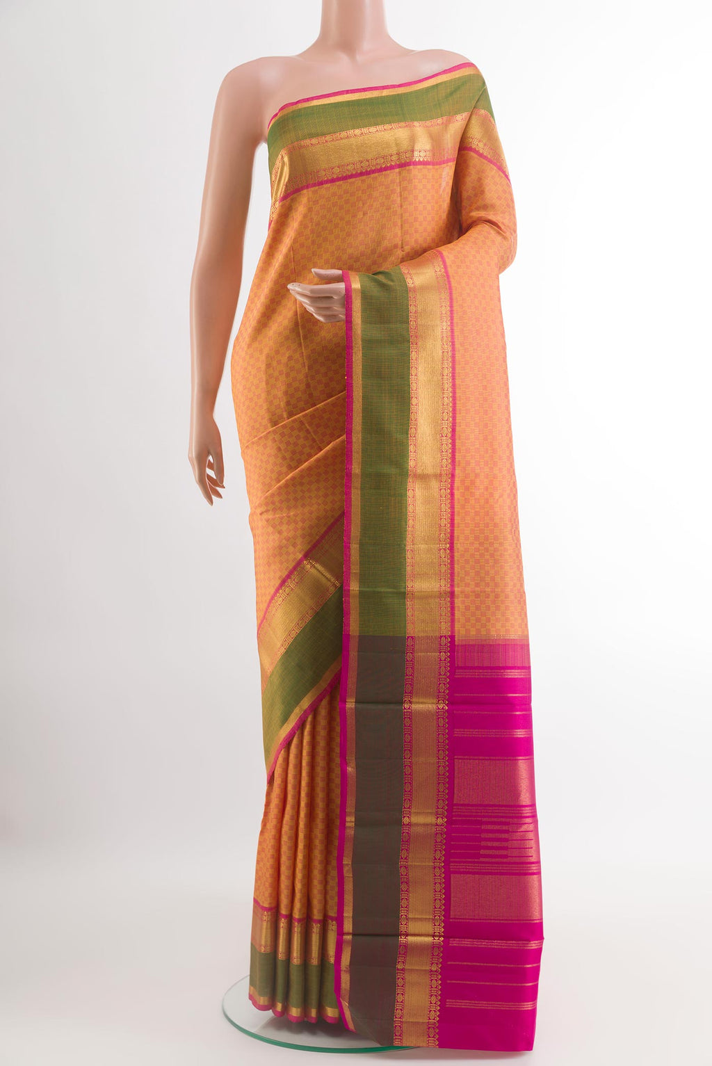 Mustard Kanchipuram Silk Saree with Checked design on the body and Zari Border.  displayed on a mannequin