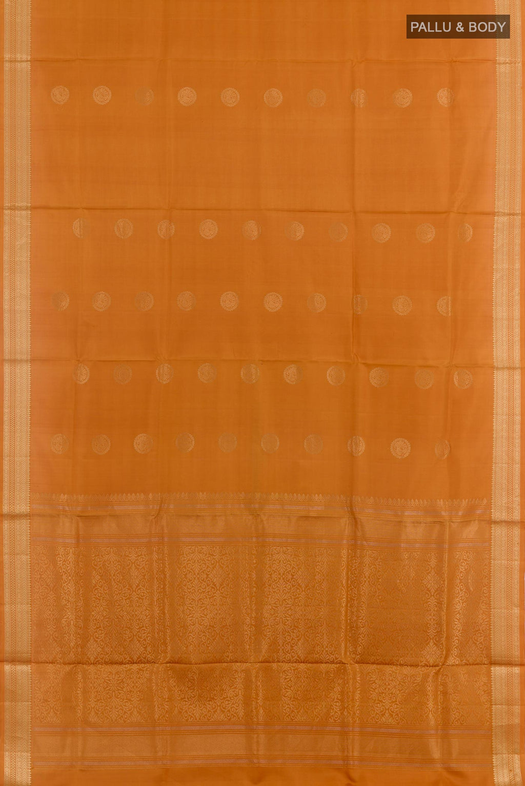 Flat view of Mustard Soft Silk Saree with Zari Butta on the body and Zari Border. 