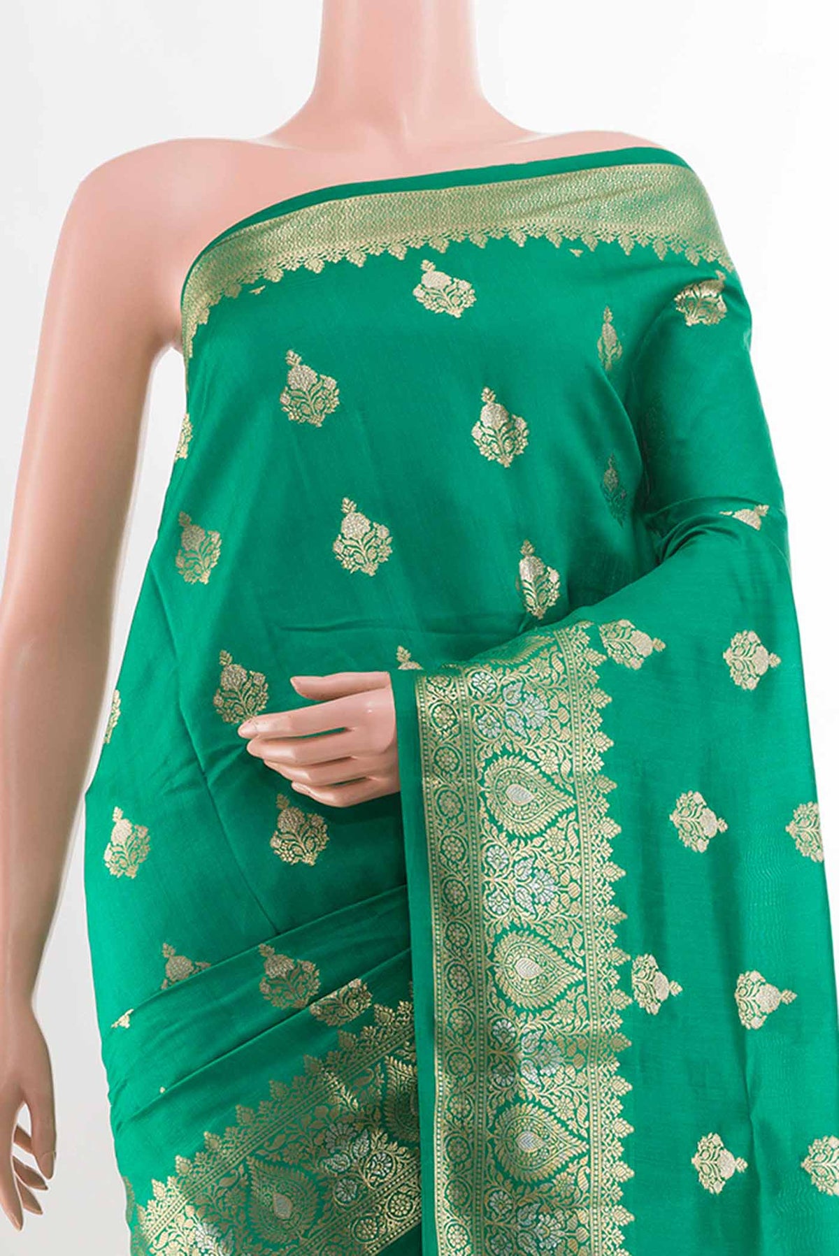 Border image of Green Tussar Silk Saree with Zari Butta on the body and Zari Border