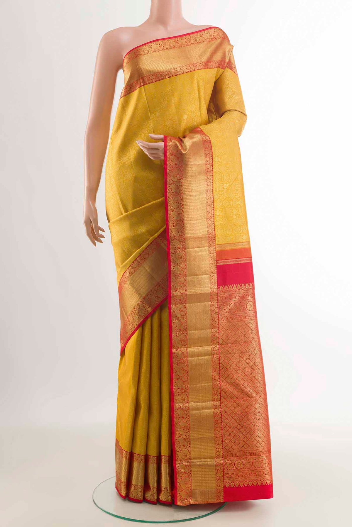 Yellow Dual Tone Kanchipuram Silk Saree with Zari Brocade on the body and Zari Border displayed on a mannequin