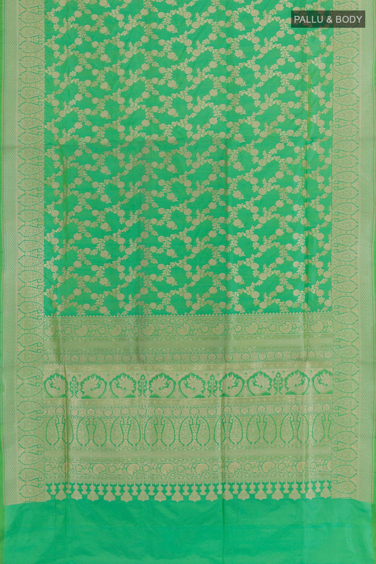 Flat view of Green Banarasi Silk Saree with Zari Brocade on the body and Zari Border. 