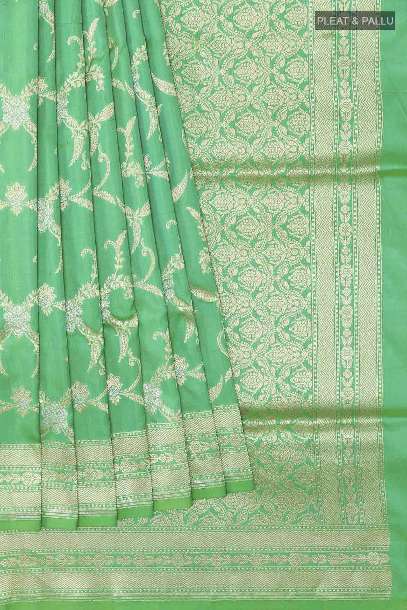 Pleats and pallu of Green Banarasi Silk Saree with Zari Brocade on the body and Zari Border