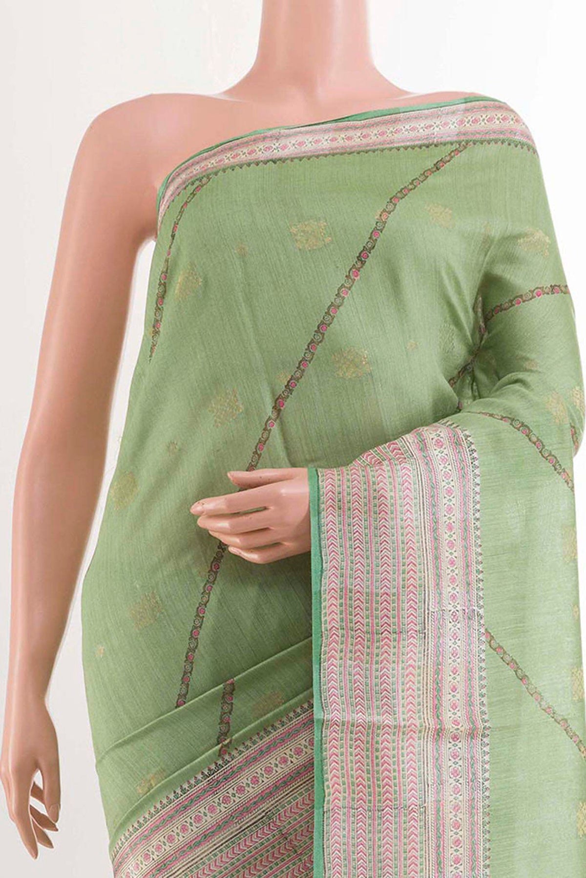 Border image of Green Tussar Saree with Stripes on the body and Printed Border
