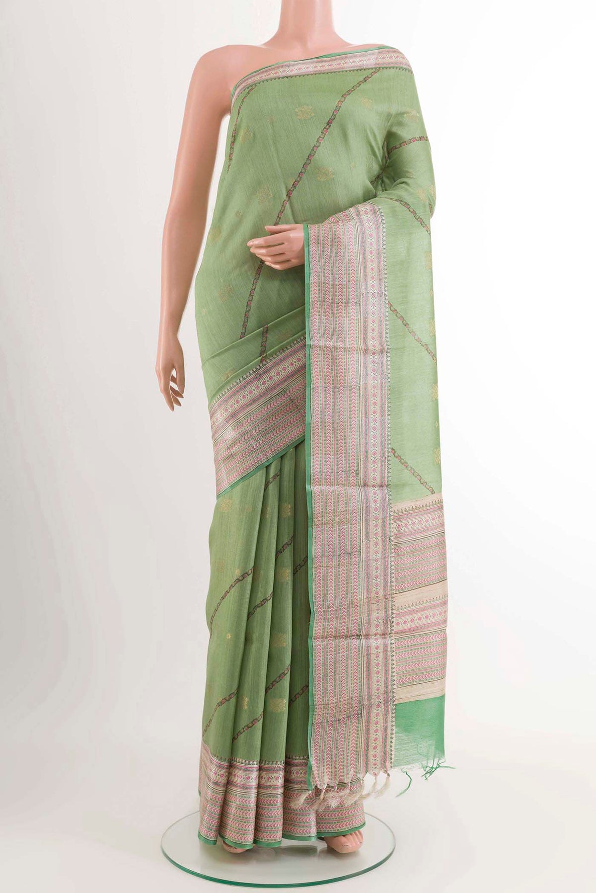 Green Tussar Saree with Stripes on the body and Printed Border displayed on a mannequin