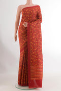 Red Printed Silk Saree with Printed design on the body and Printed Border.  displayed on a mannequin