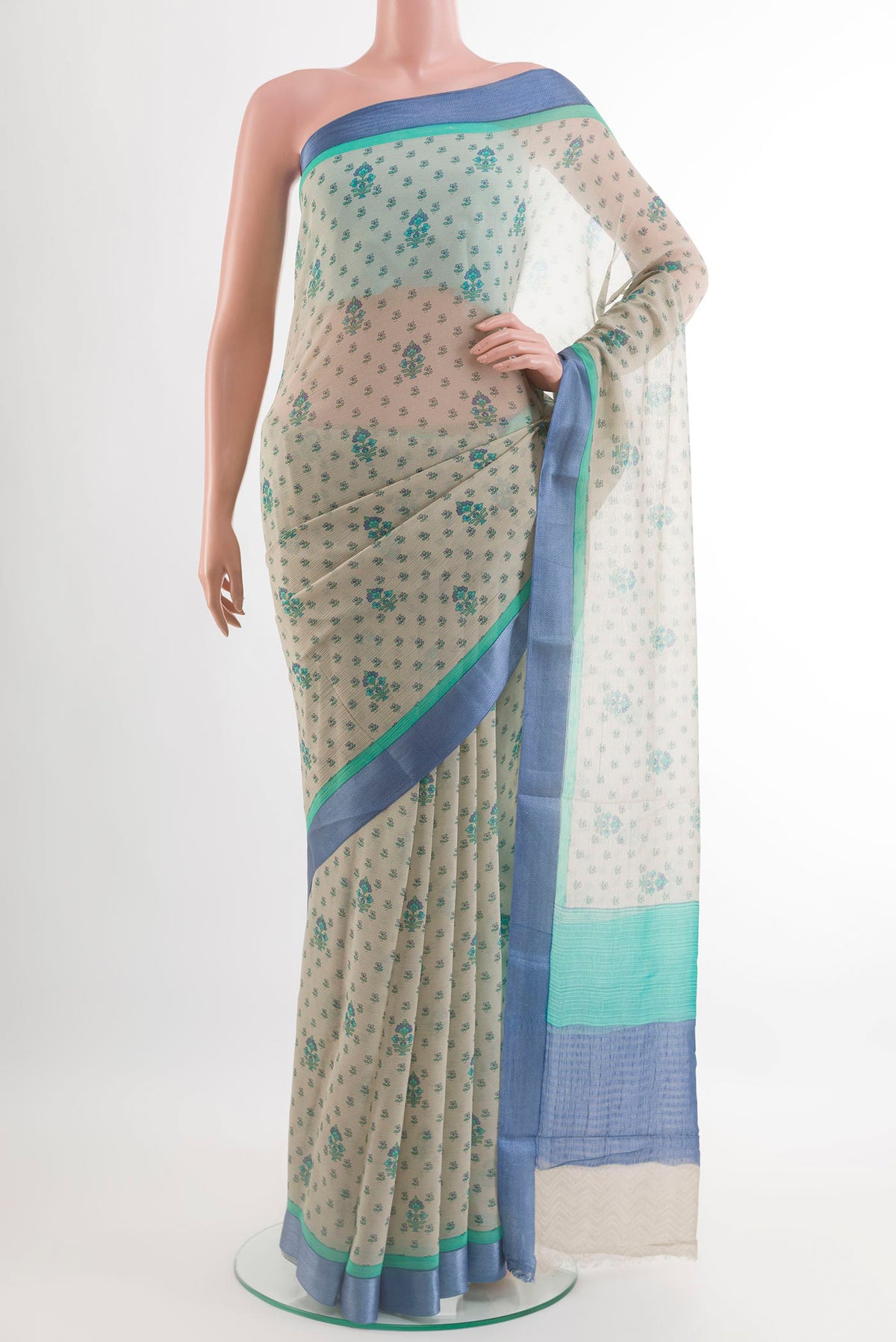 Grey Mysore Chiffon Saree with Printed design on the body and Plain Border.  displayed on a mannequin