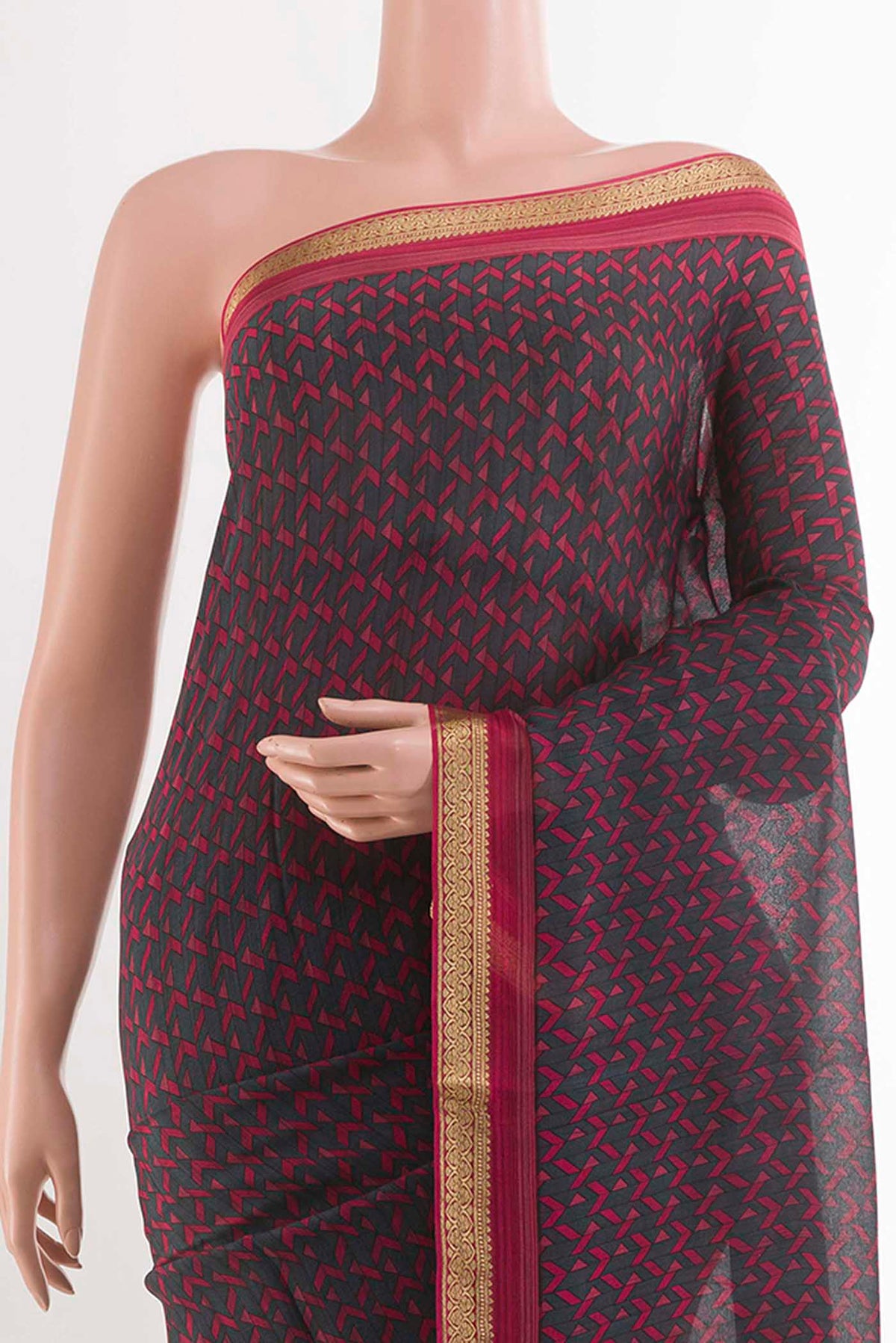 Border image of Black Crepe SareePrinted design on the body and Zari Border