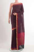 Black Crepe SareePrinted design on the body and Zari Border displayed on a mannequin