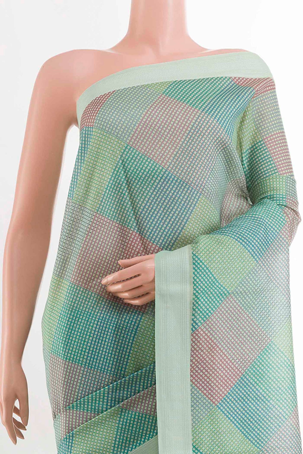 Border image of Teal Tussar SareePrinted design on the body and Embroidery Border