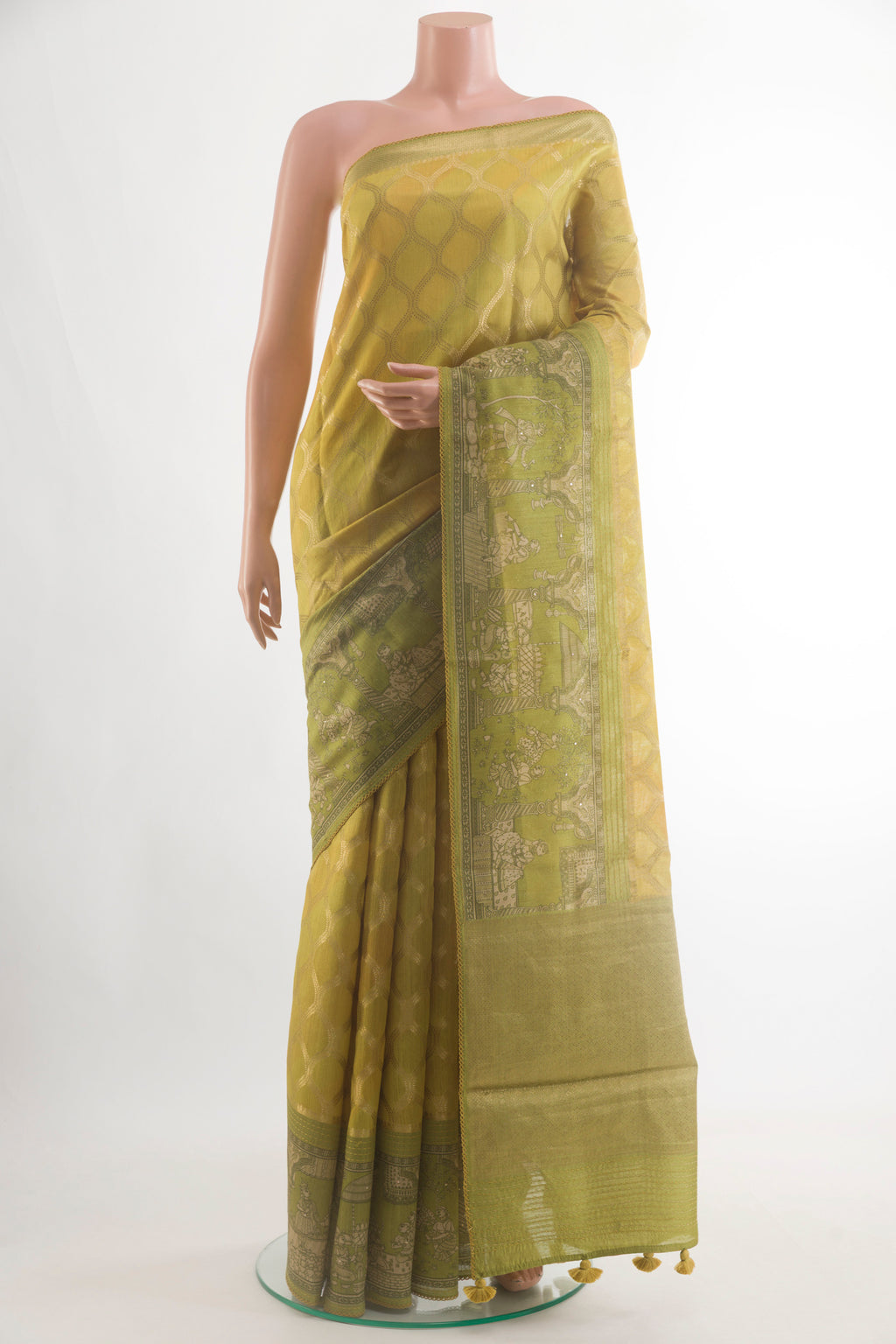 Yellow Tussar Silk Saree with Zari Brocade on the body and Zari Border.  displayed on a mannequin