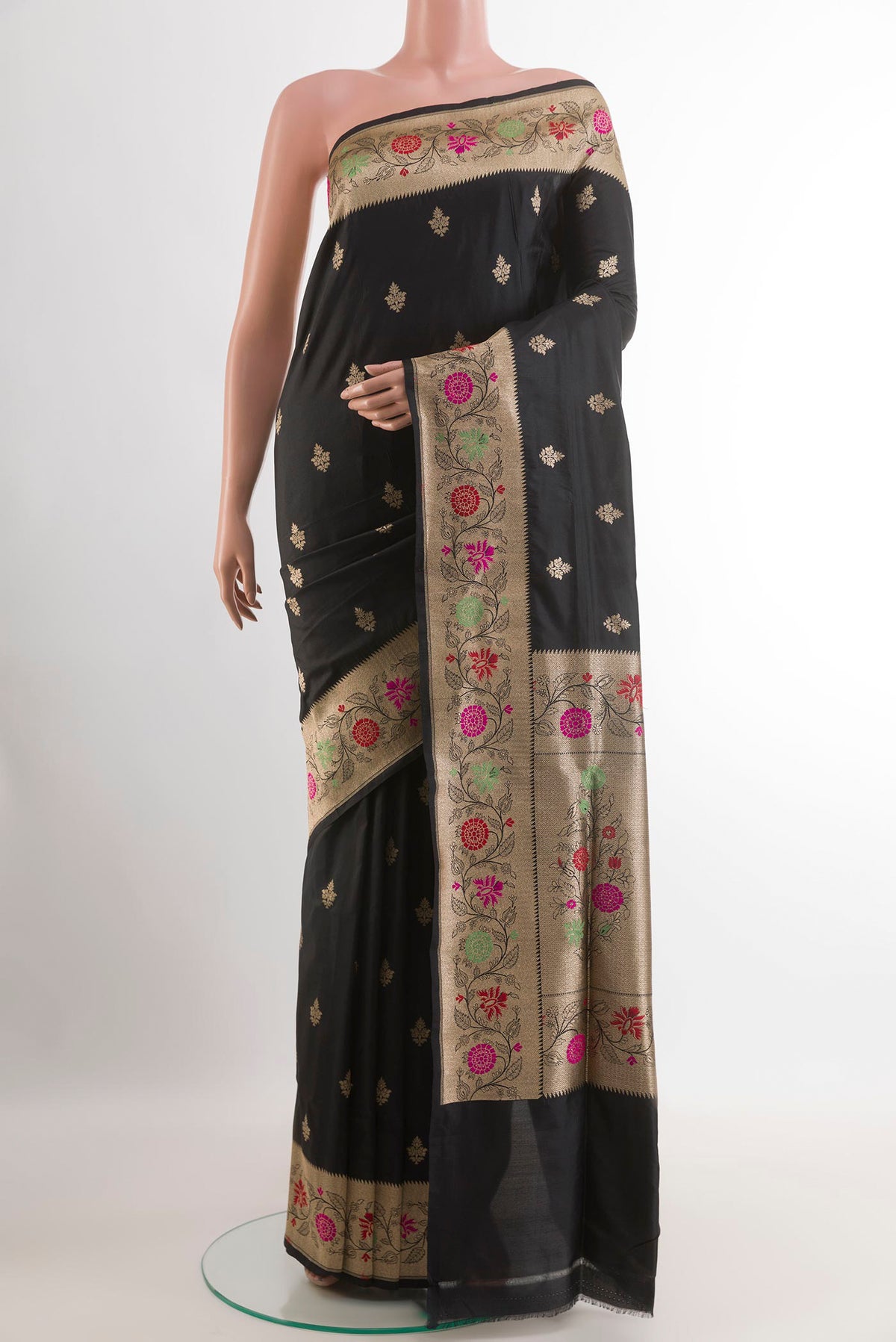 Black Banarasi Silk Saree with Zari Butta on the body and Zari Border.  displayed on a mannequin