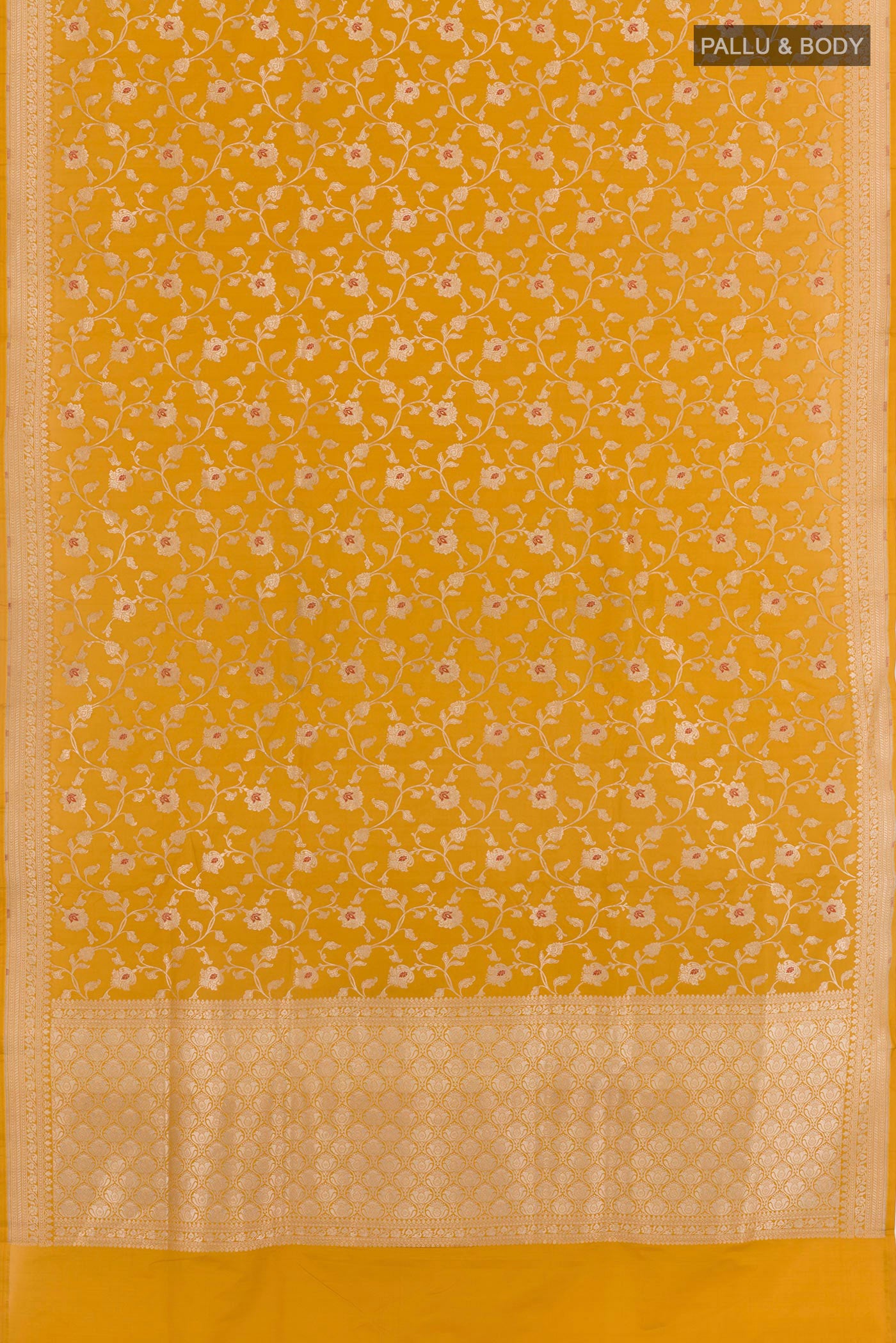 Flat view of Mustard Banarasi Silk Saree with Zari Brocade on the body and Zari Border. 