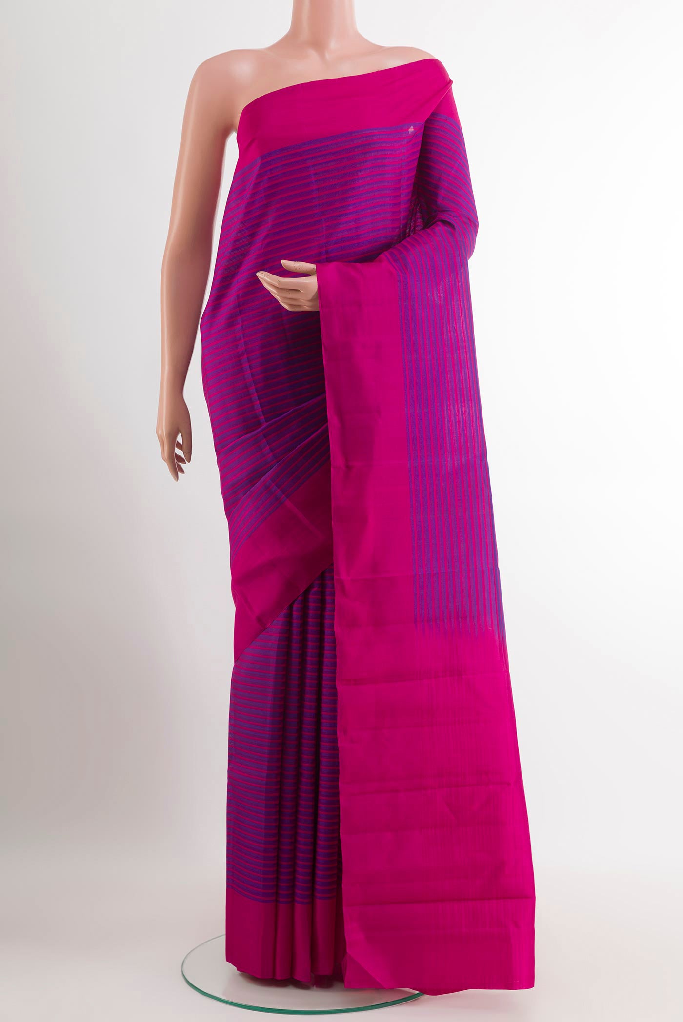 Purple Kanjivaram Silk Saree with Stripes on the body and Plain Border.  displayed on a mannequin