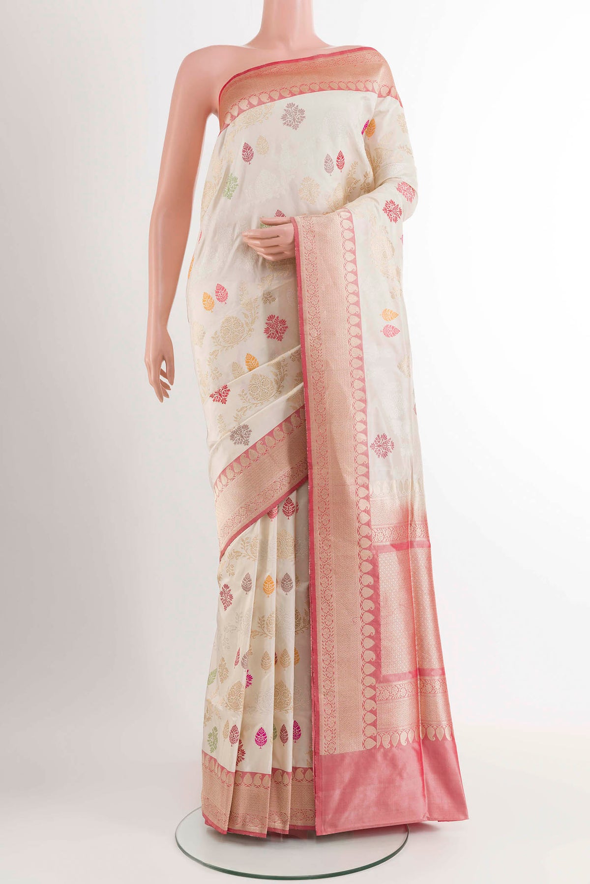 Off White Banarasi Silk Saree with Zari Brocade on the body and Zari Border displayed on a mannequin