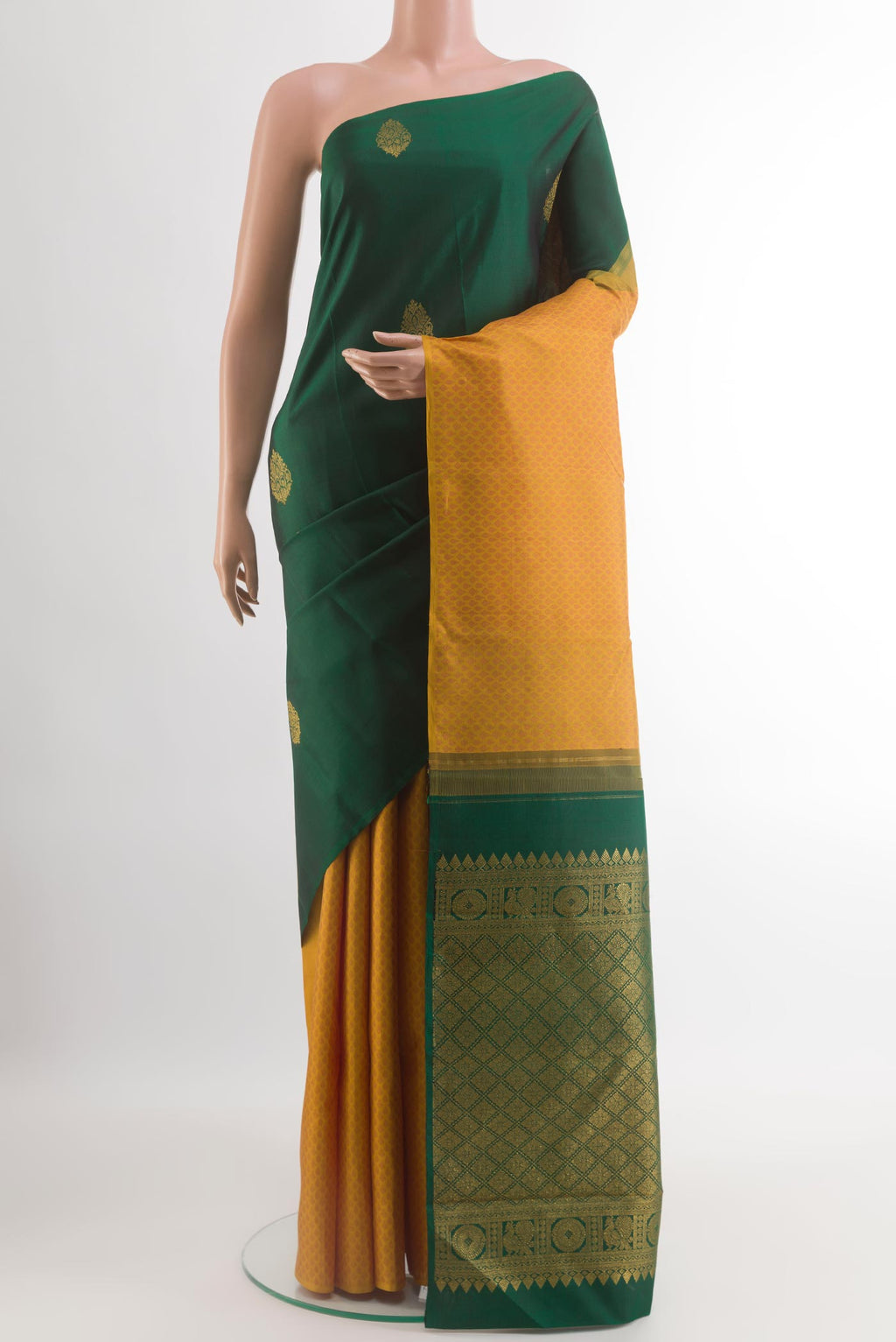 Bottle Green Kanchipuram Silk Saree with Half And Half on the body and Without Border.  displayed on a mannequin