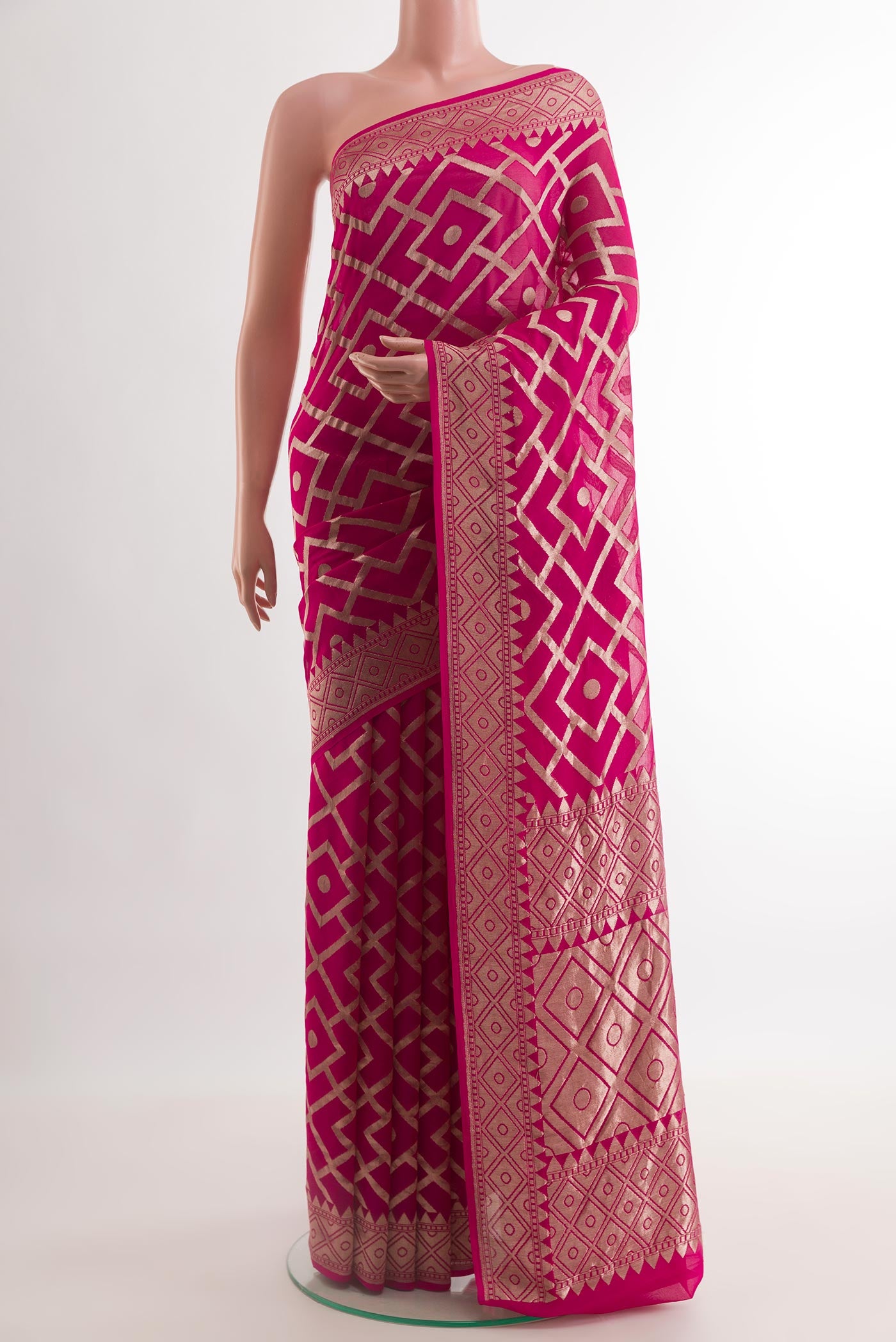 Rani Pink Banarasi Georgette Saree with Zari Brocade on the body and Zari Border.  displayed on a mannequin