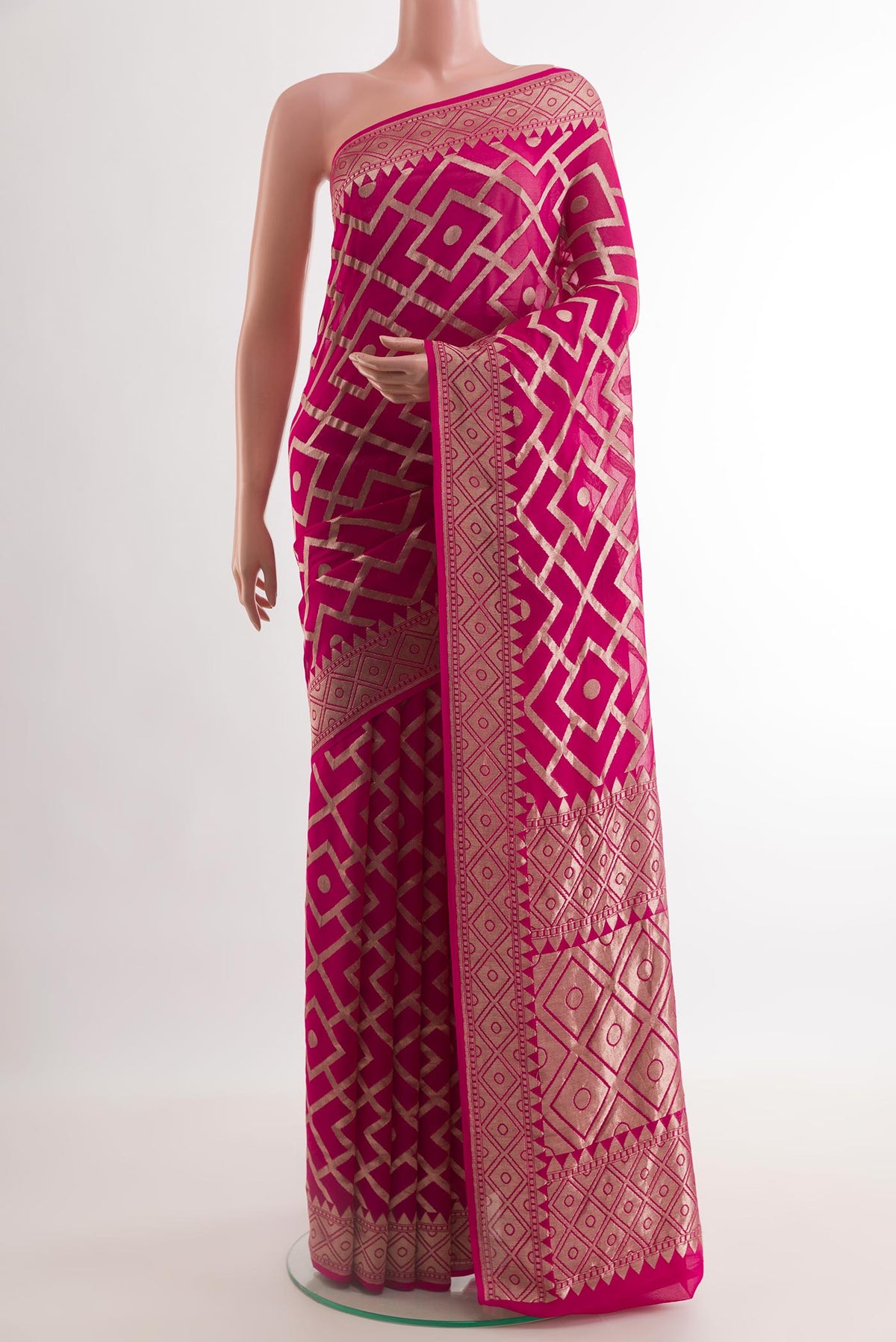 Rani Pink Banarasi Georgette Saree with Zari Brocade on the body and Zari Border.  displayed on a mannequin