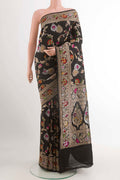 Black Banarasi Tussar Silk Saree with Zari Brocade on the body and Zari Border displayed on a mannequin