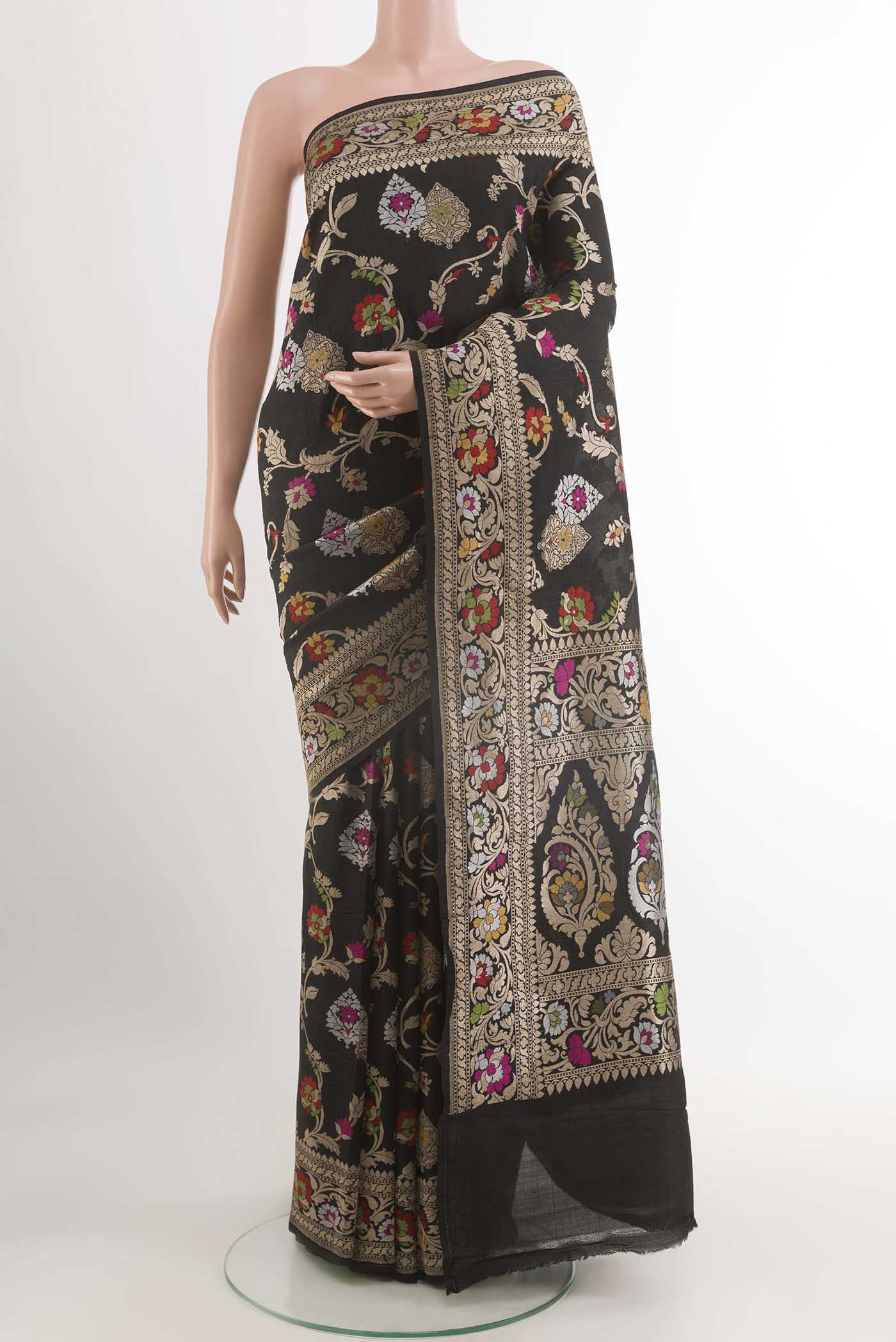 Black Banarasi Tussar Silk Saree with Zari Brocade on the body and Zari Border displayed on a mannequin