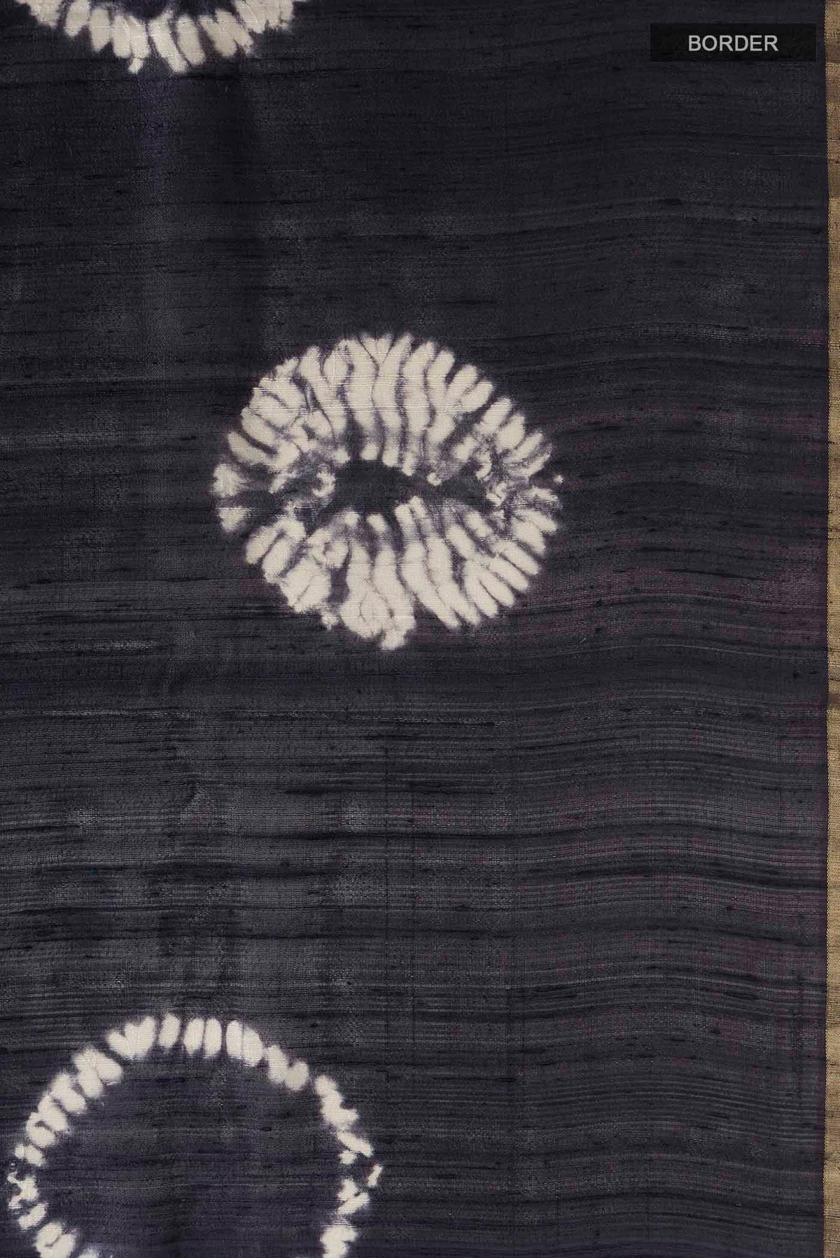 Border image of Grey Raw Silk Saree with Printed design on the body and Zari Border