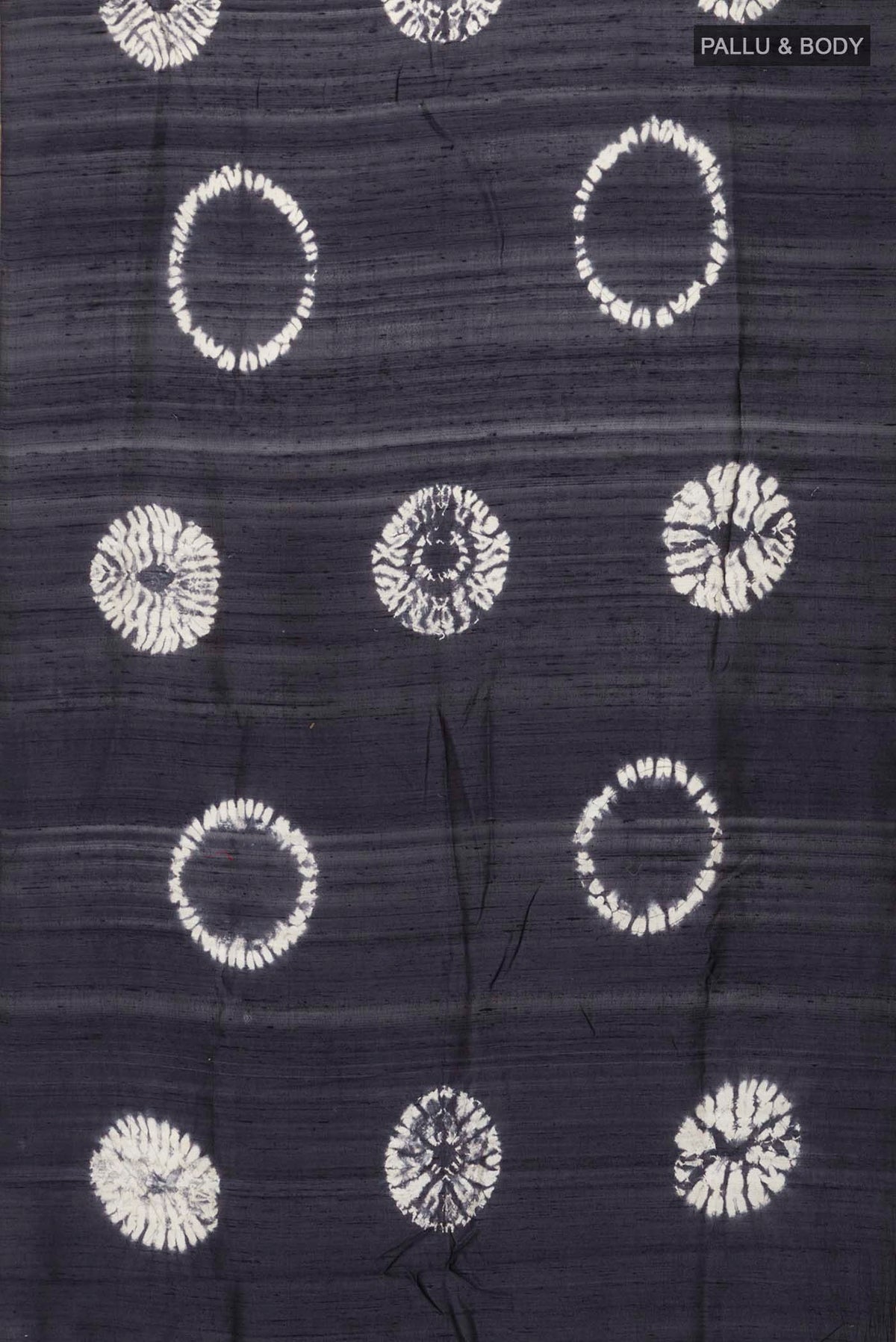 Flat view of Grey Raw Silk Saree with Printed design on the body and Zari Border